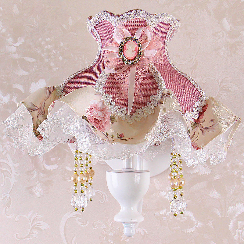 1-Light Taavita Garden Wall Light with Ruffle Pink Fabric Shade, Curved Arm, and Crystal Decoration