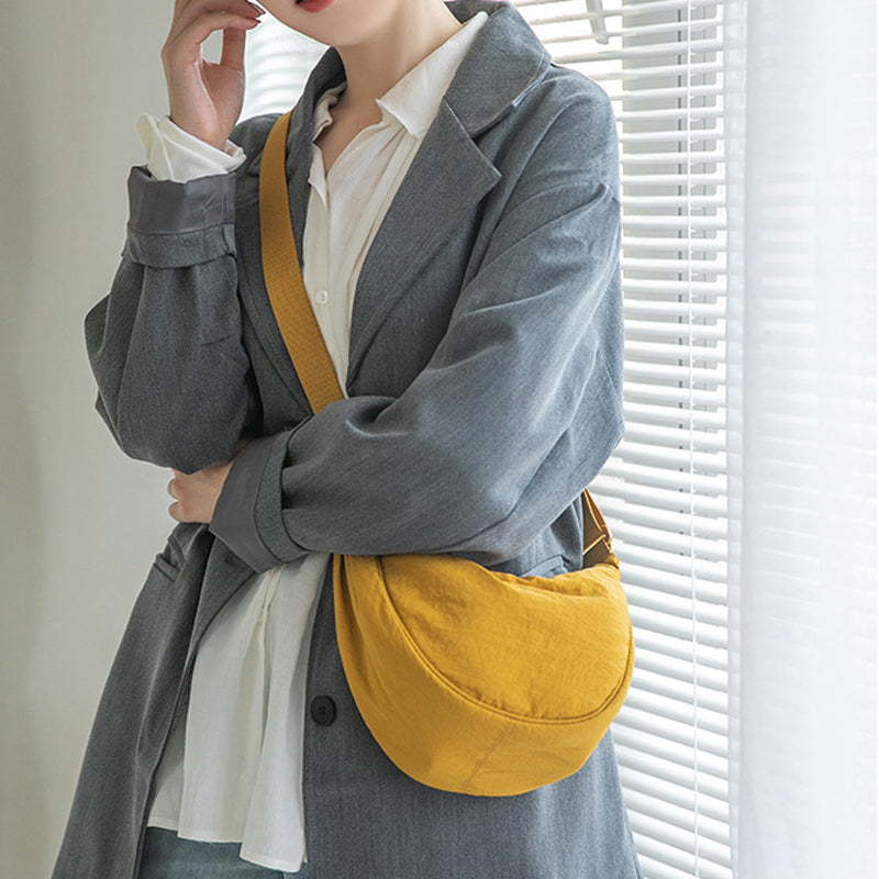 Crescent-shaped Crossbody Bag | Durable Polyester | Adjustable Strap | Compact & Organized Storage
