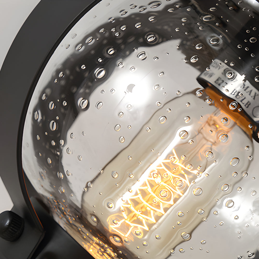 1-Light Black Outdoor Wall Lantern with Curved Arm and Seeded Glass Globe LED by Taavita