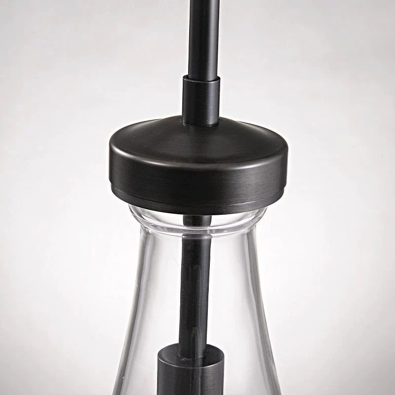 Liora — Hand-Blown Glass Raindrop Pendant Light with Warm Glow