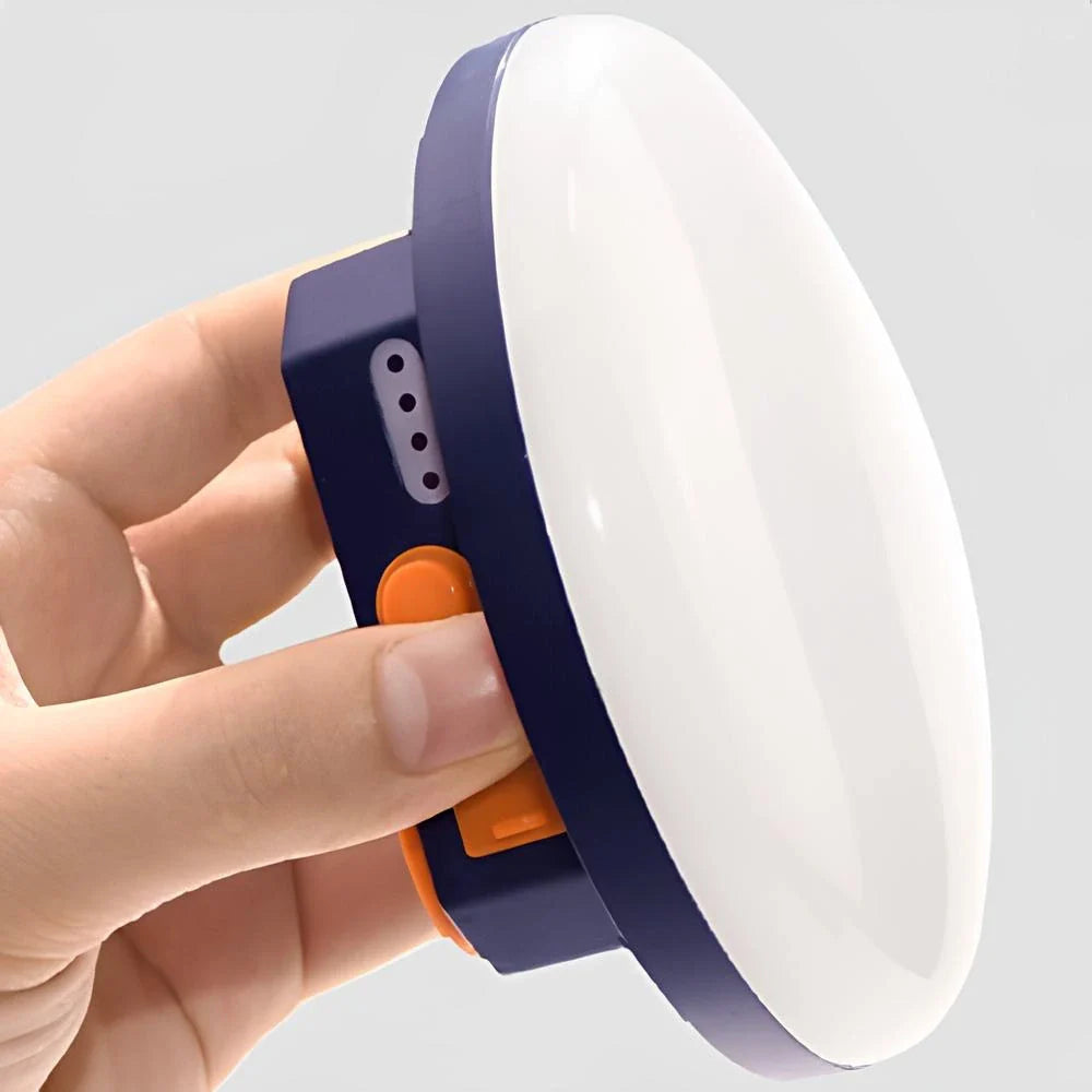 Compact Power Bank with Dual Light Modes – Rugged Charger for Adventures