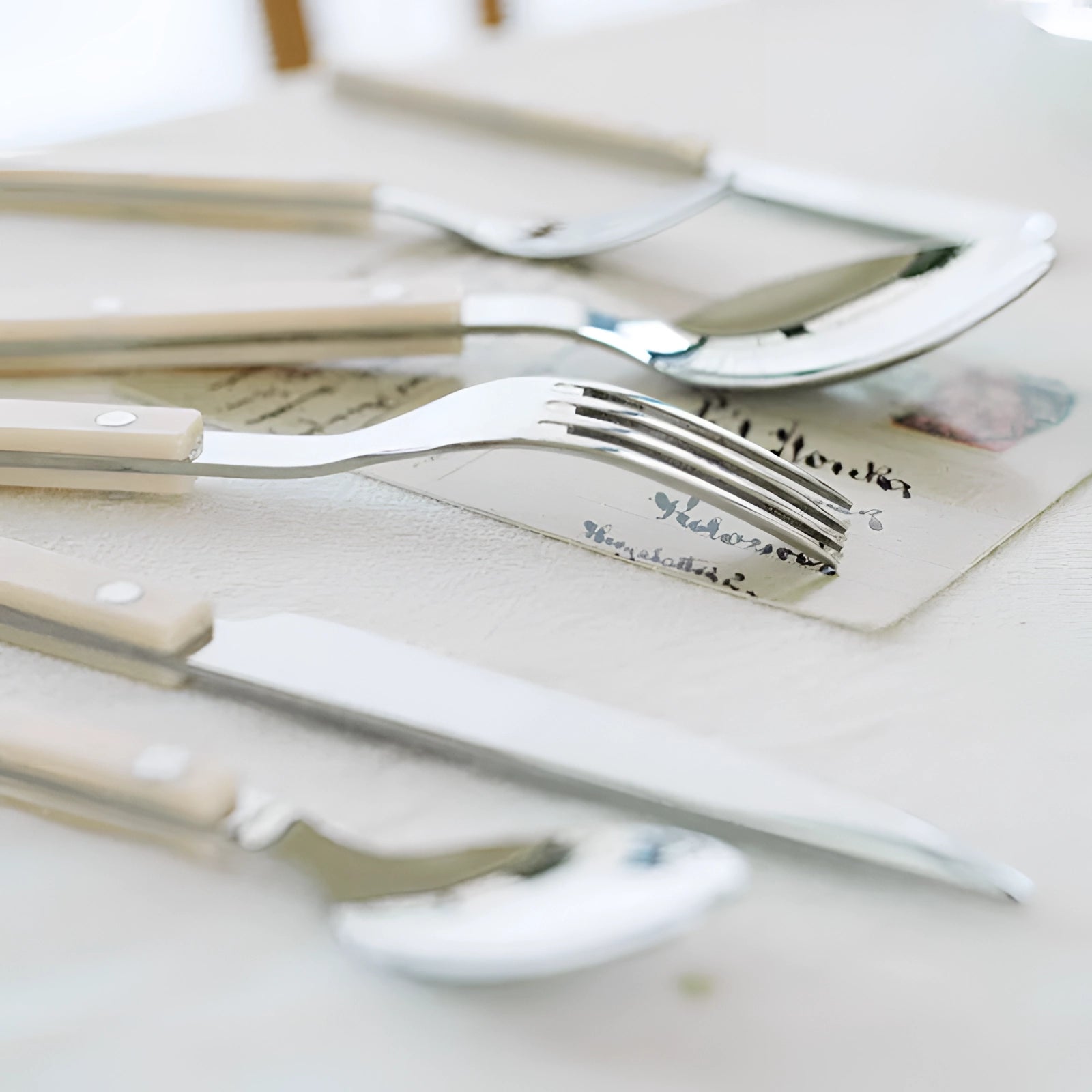 24-Piece Stainless Steel Silverware Set with Contemporary Black Handles