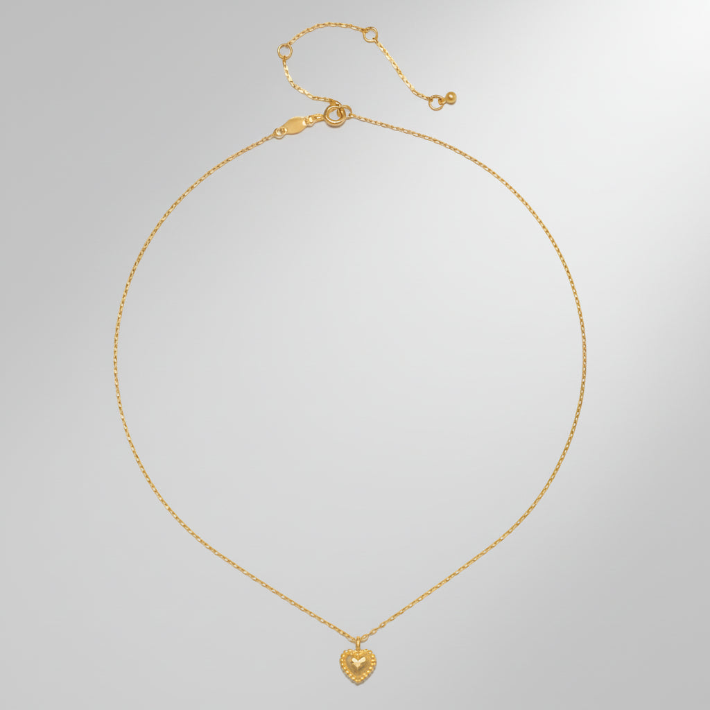 Elegant Gold Heart Pendant Necklace with Textured Design