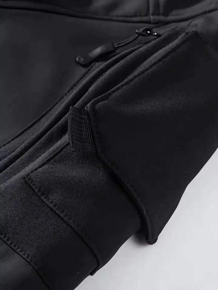 ShieldMaster Tactical Waterproof Jacket for All-Weather Adventures