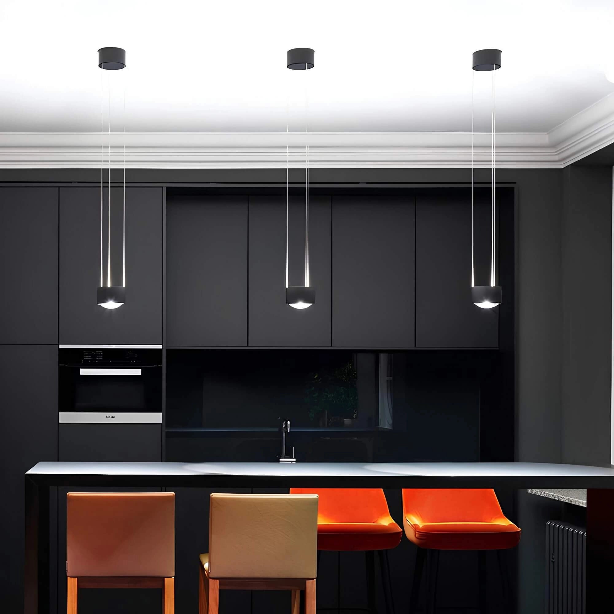 Black rectangular 10W LED pendant light with modern adjustable design, suspended from the ceiling, illuminating an interior space.