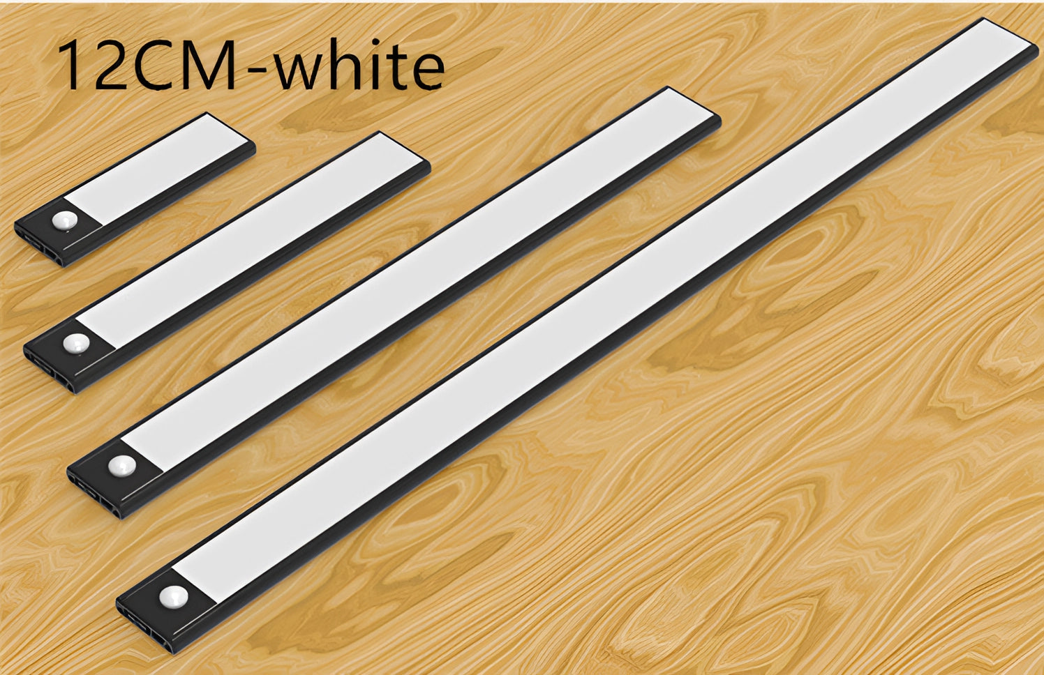12cm magnetic warm white LED strip light with a sleek, modern design, featuring a white and black coloration, ideal for contemporary kitchen lighting setups, shown against a wooden surface background.