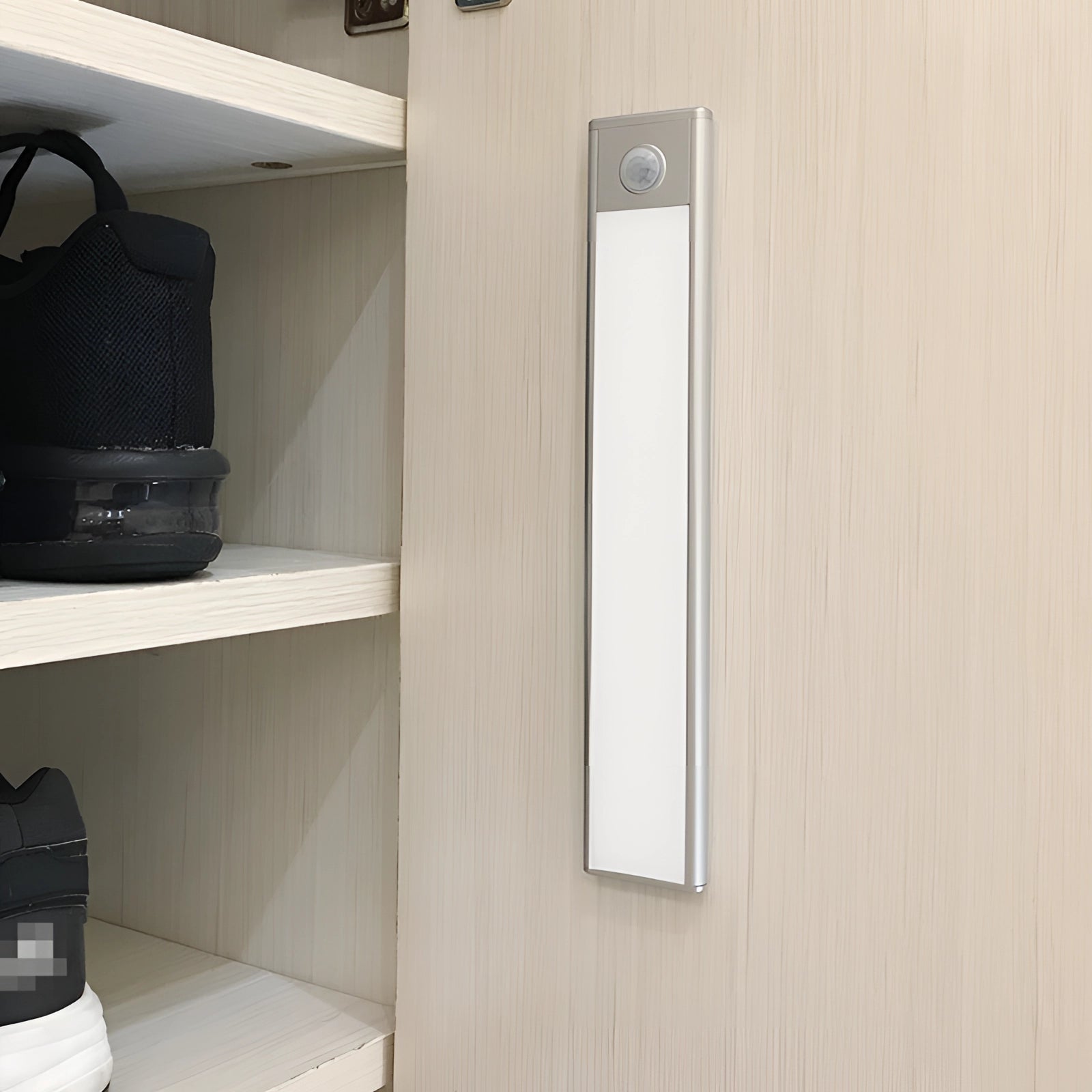 Modern kitchen with wooden shelves illuminated by a 12CM magnetic warm white LED strip, providing soft ambient lighting.
