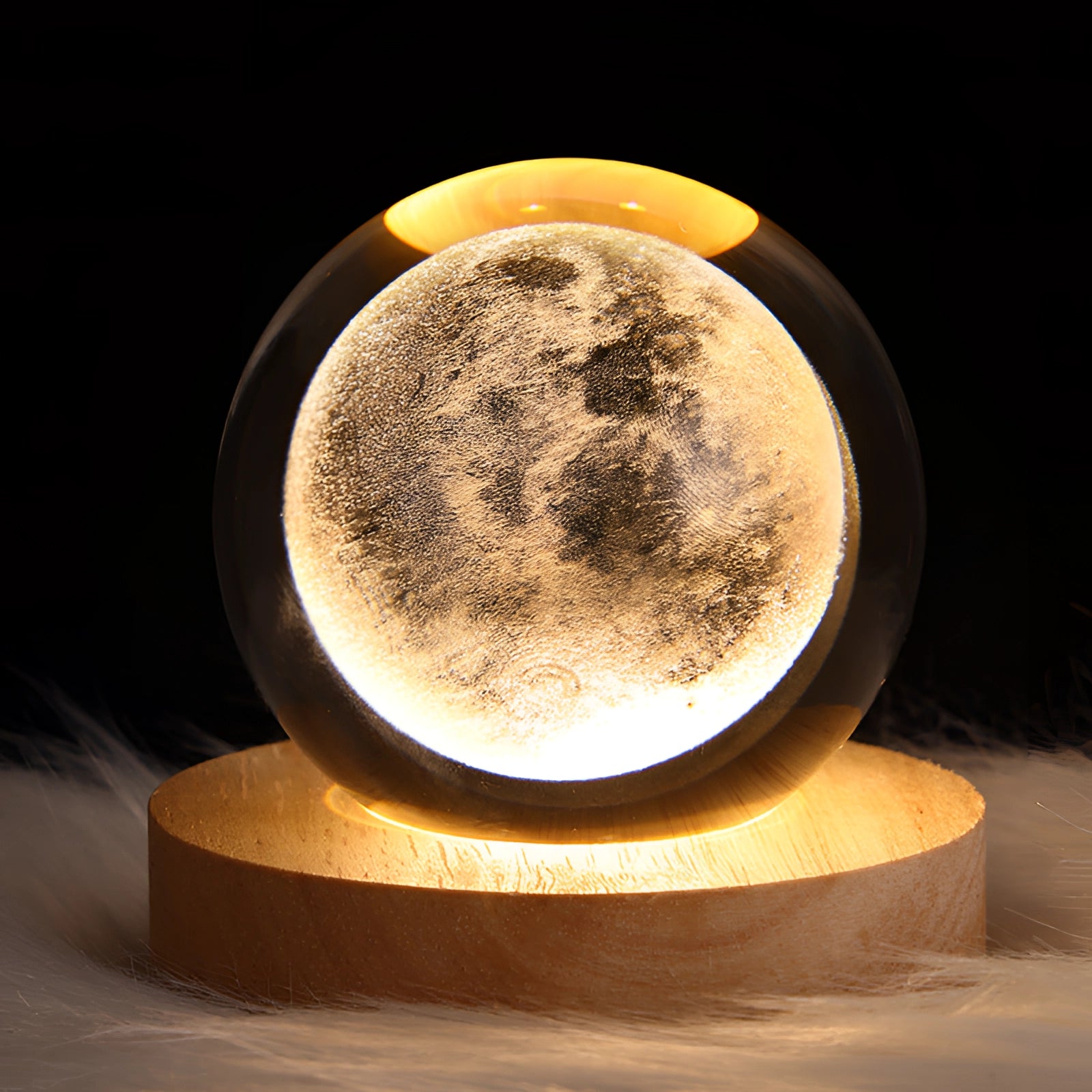 3D crystal ball LED light featuring a laser-engraved moon design, measuring 6 cm in diameter, with a glowing effect and artistic detailing, resembling an astronomical object in a circular shape.