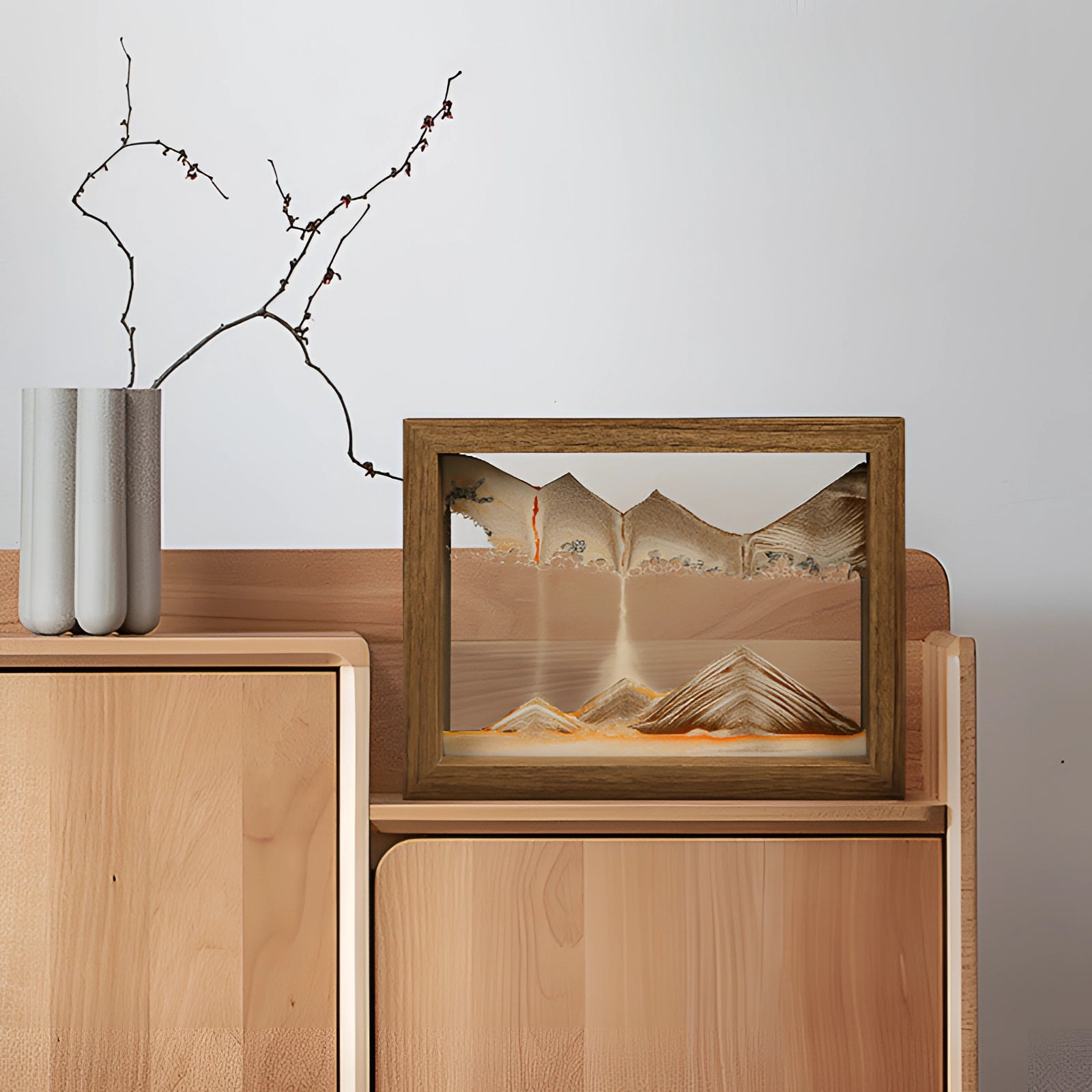 3D Kinetic Sand Art Picture Frame in Aqua Blue on a wooden table, showcasing a unique moving sand display suitable for desk decor and interior design.