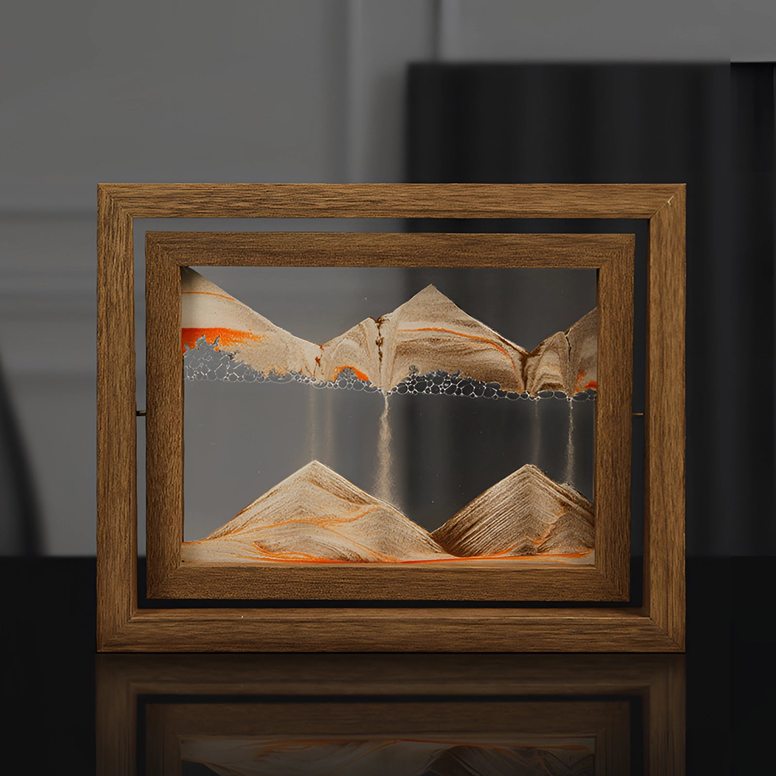 Aqua blue 3D kinetic sand art enclosed in a rectangular picture frame, featuring a symmetrical design with a wooden border, suitable for desk display.
