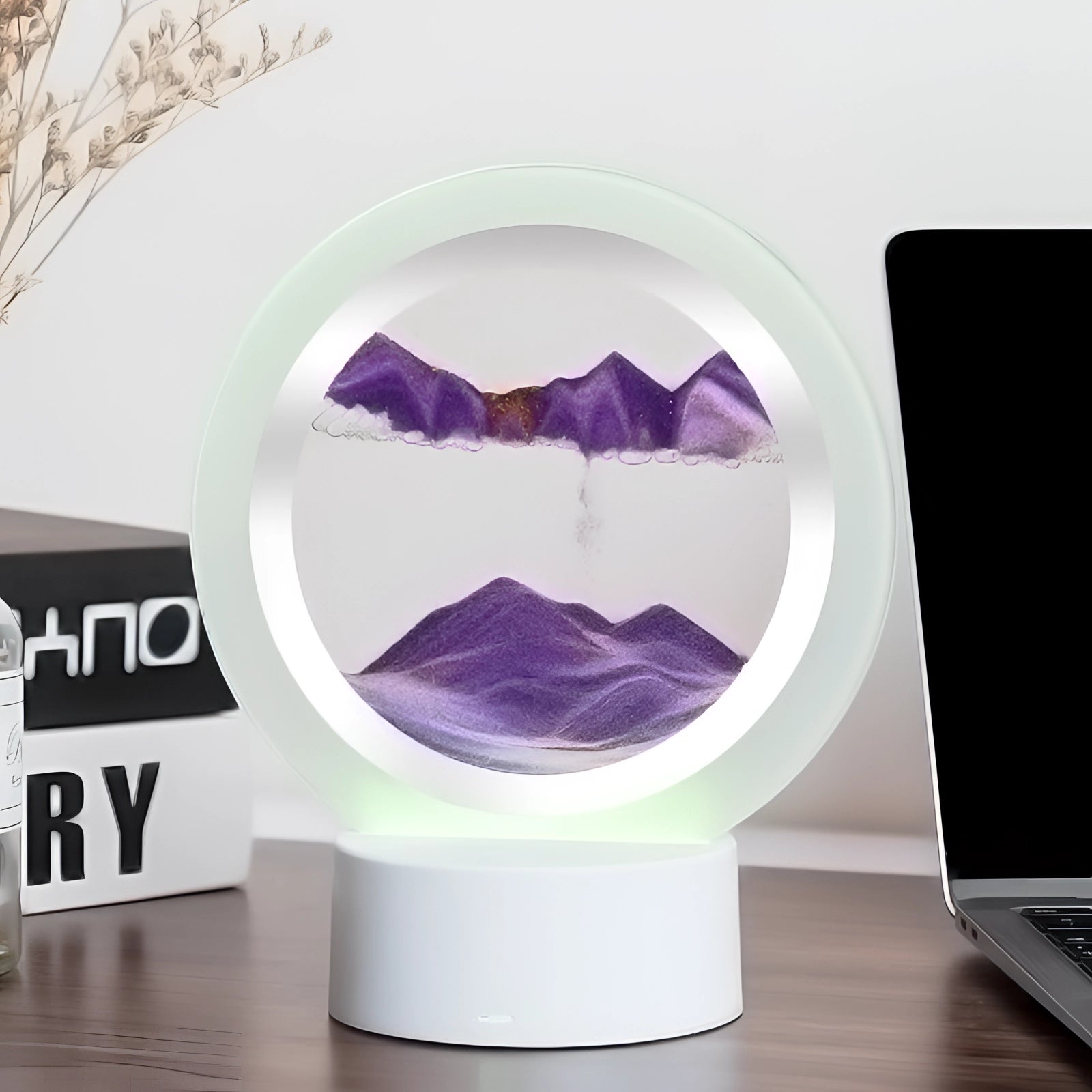 Purple 3D LED Sand Art Night Light Lamp with a resin mountain design, depicted in a modern interior setting.