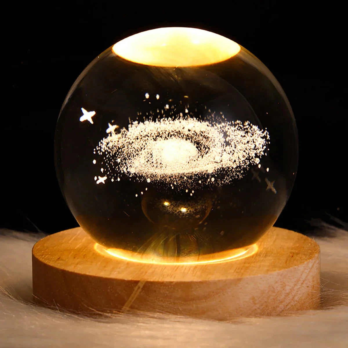 3D Solar System Crystal Ball Lamp with LED base featuring an illuminated depiction of the solar system in amber hues, displayed on a dark background.