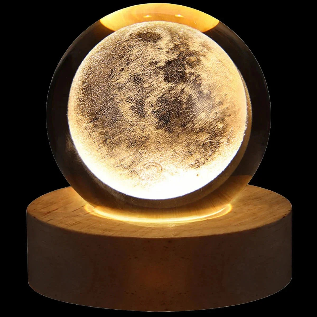 3D Solar System Crystal Ball Lamp with Moon design, featuring a glowing LED base that emits a soft yellow light. The circular crystal ball intricately depicts astronomical objects and serves as an artistic and decorative piece.