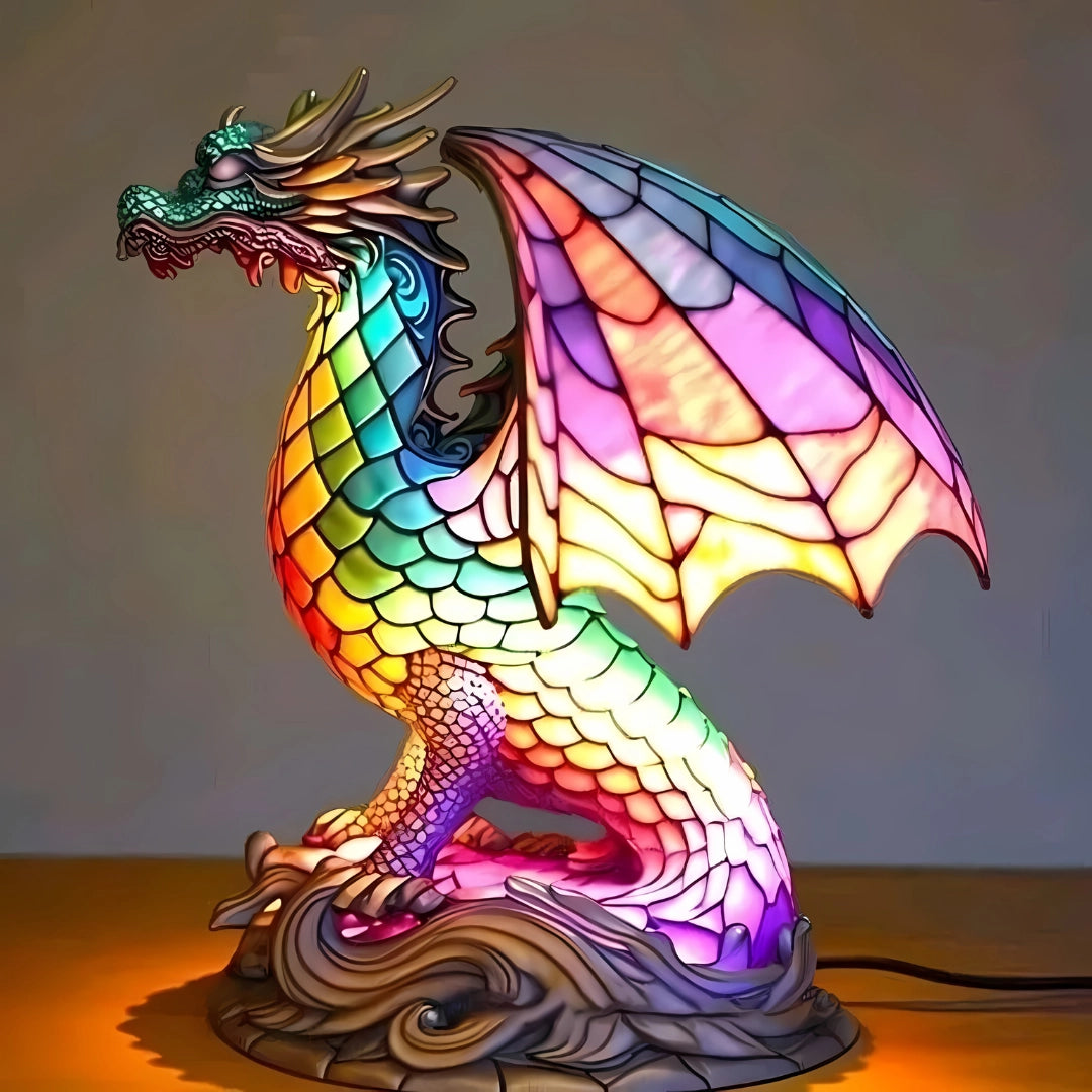 A multicolored stained glass night light in the shape of a dragon, featuring intricate details with vibrant purple and magenta tones, showcasing mythical art with outspread wings and a defined beak.