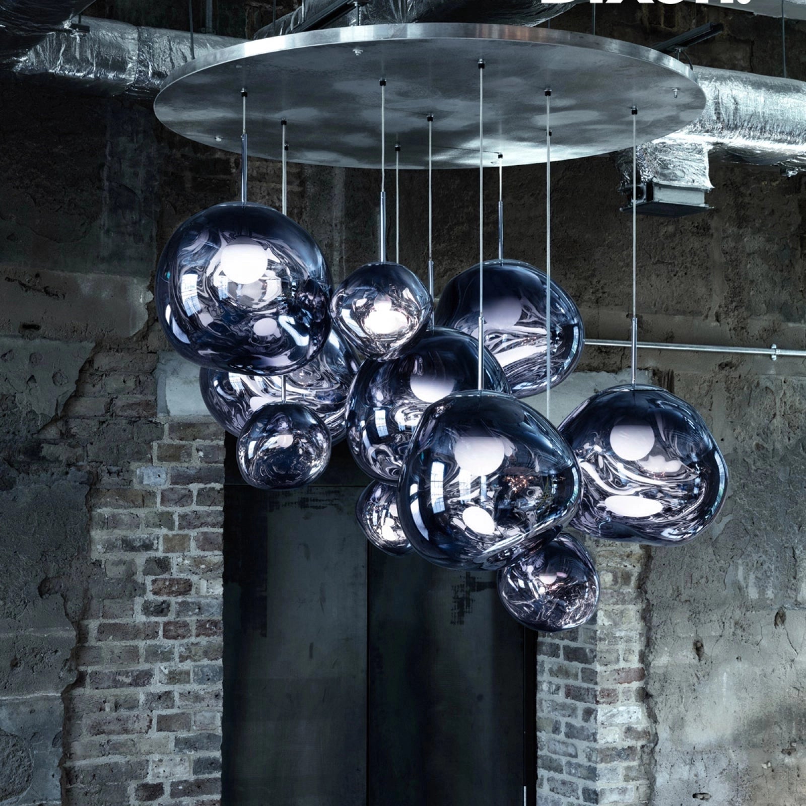 Modern copper ceiling lamp featuring an amber glass triple pendant light fixture.