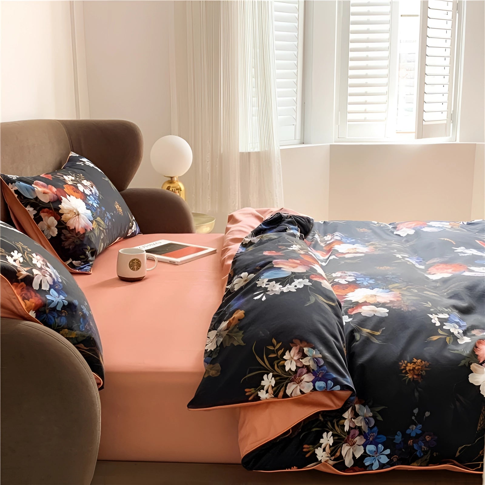 Black floral luxury satin bedding with a silk touch duvet cover displayed on a bed with matching pillows, set in a stylish and comfortable interior design setting.