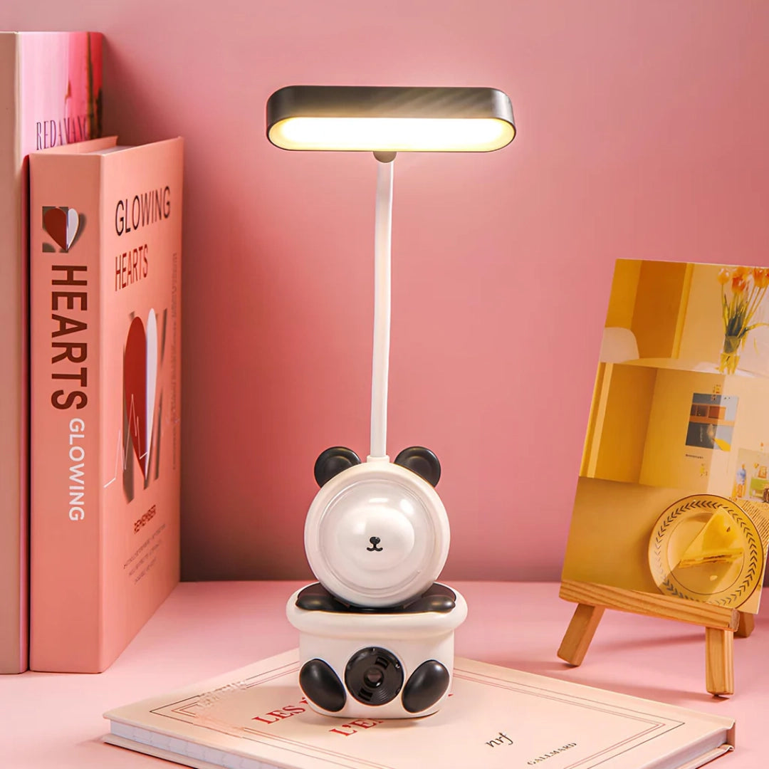 Cartoon Bunny LED Desk Lamp in Black with USB Rechargeable feature and Touch Control, displayed on a shelf.