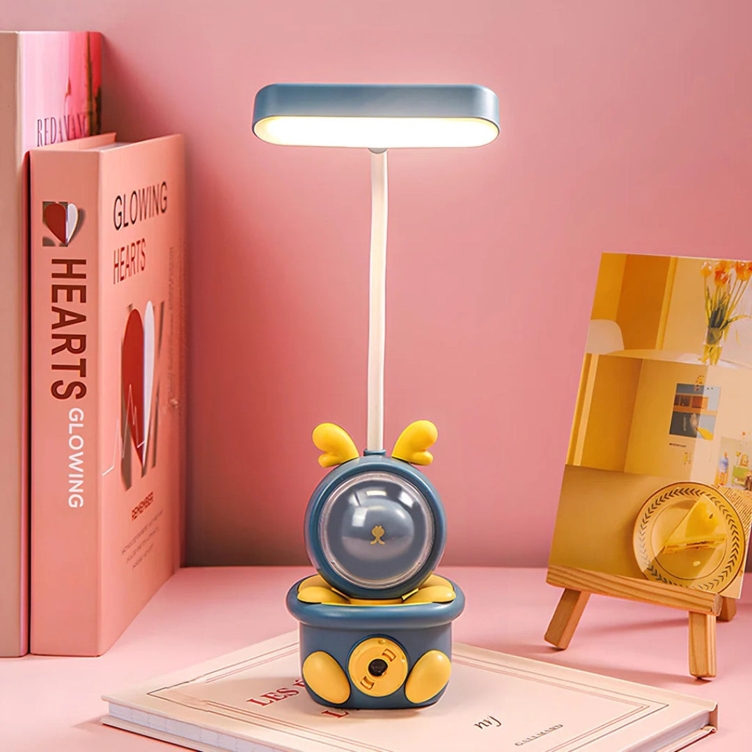 Cartoon Bunny LED Desk Lamp in green with a USB rechargeable feature and touch control, designed with a playful yellow and magenta color scheme, suitable for a child's room or as a decorative baby toy.