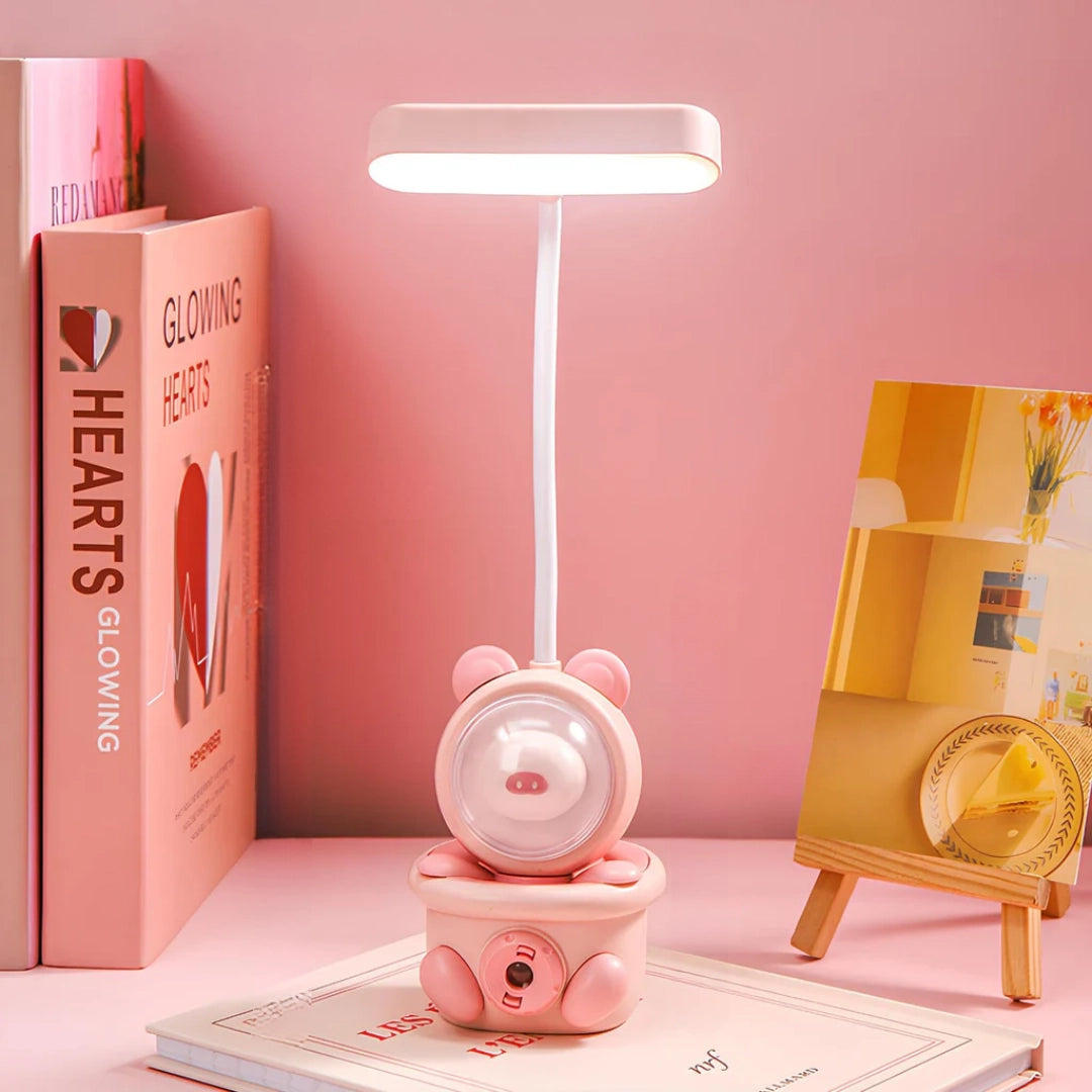 Cartoon Bunny LED Desk Lamp in pink with USB rechargeable function and touch control features, designed with a playful bunny shape, suitable for children's rooms or as a whimsical home decor item.