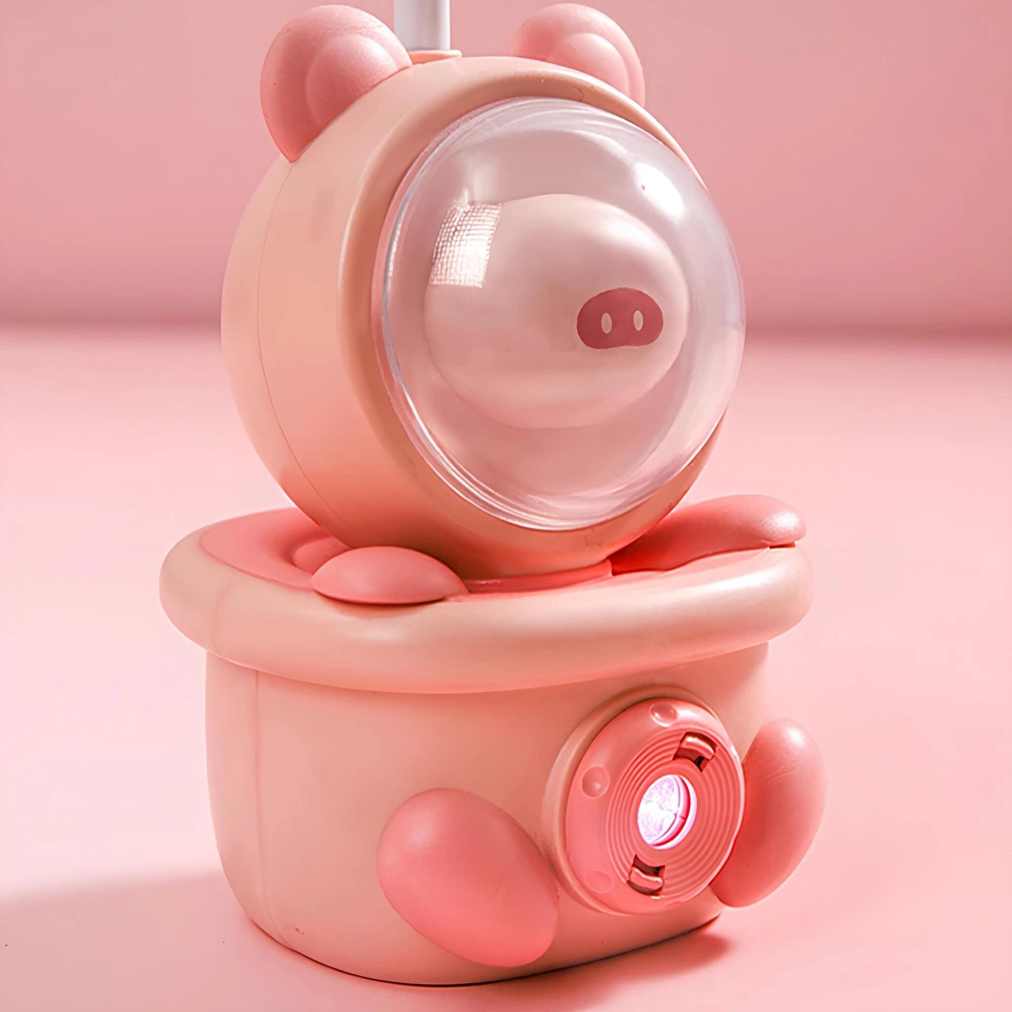 Cartoon Bunny LED Desk Lamp in pink featuring a cute bunny design, USB rechargeable with touch control, made of plastic material.