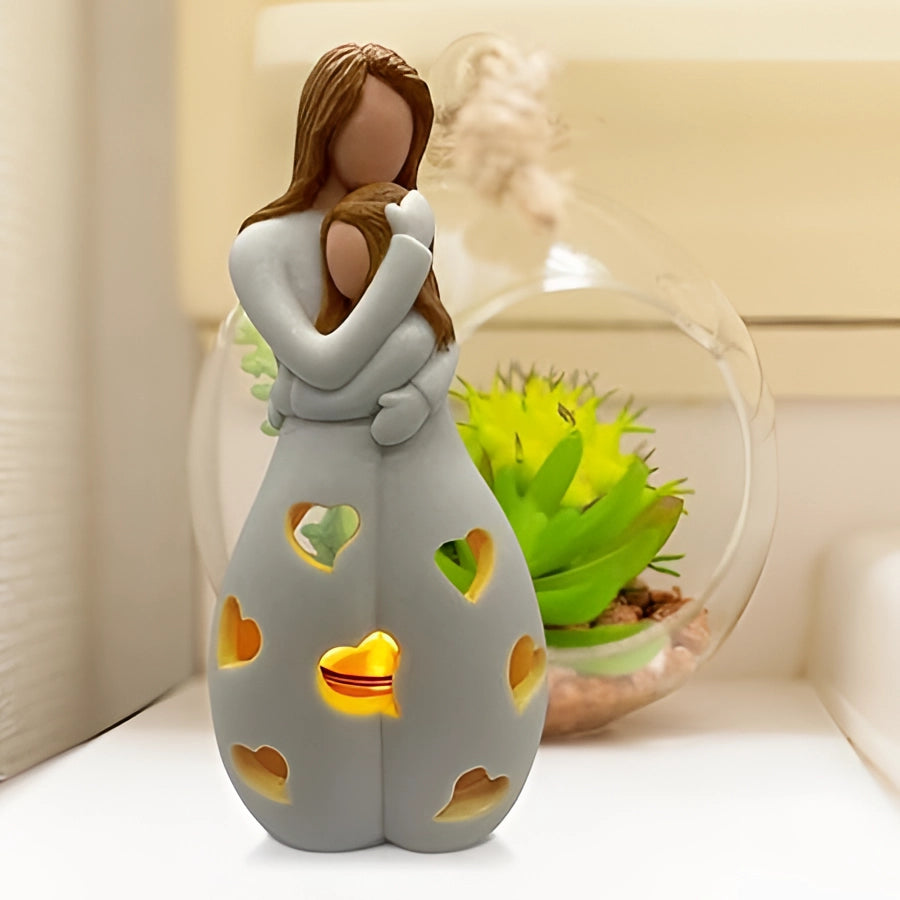 Ceramic heart-patterned love lamp with a soft glow, positioned on a table next to a decorative flowerpot and houseplant, creating a romantic ambiance.