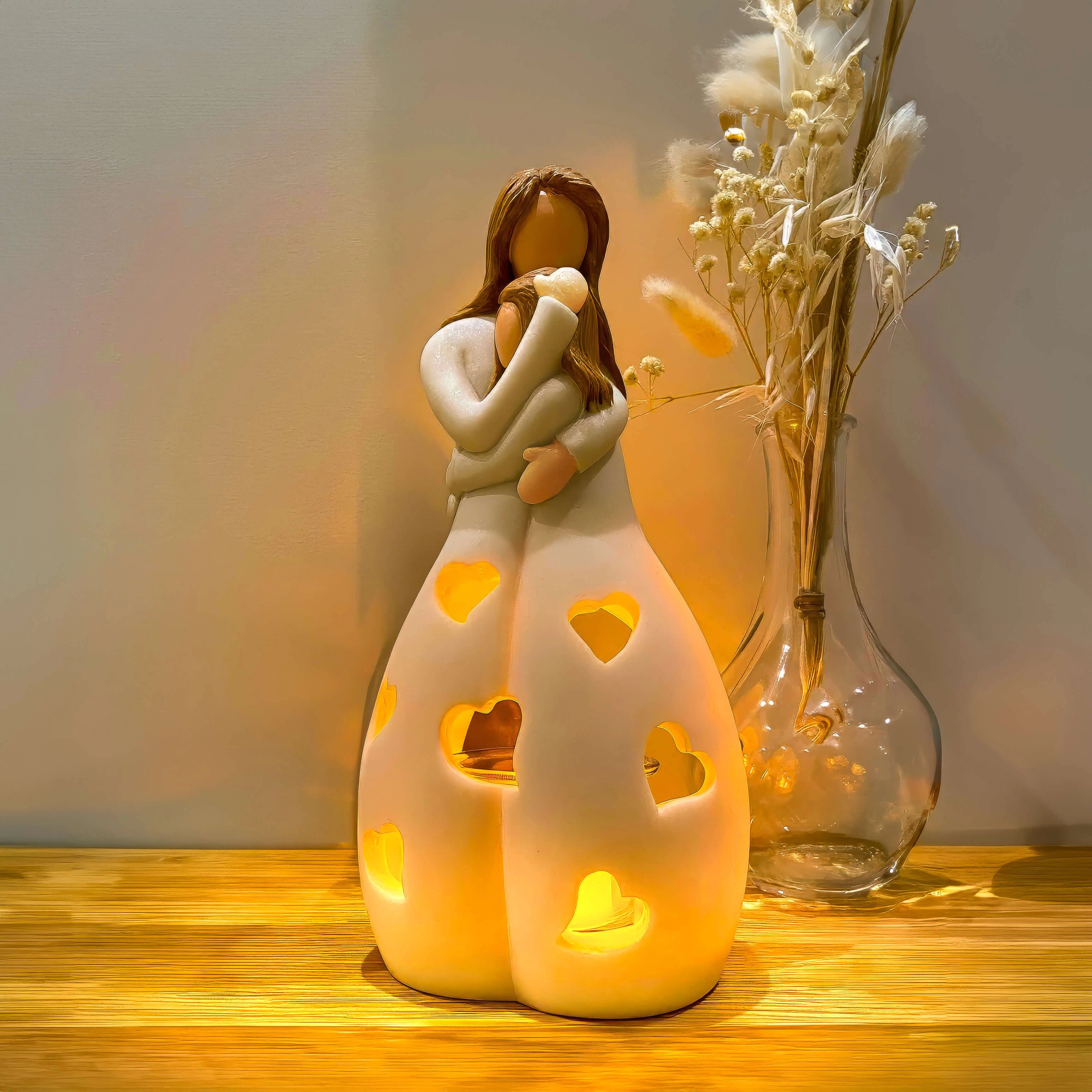Ceramic Love Lamp with a heart pattern, emitting a warm glow, placed on a wooden table, designed as a romantic night light for couples.