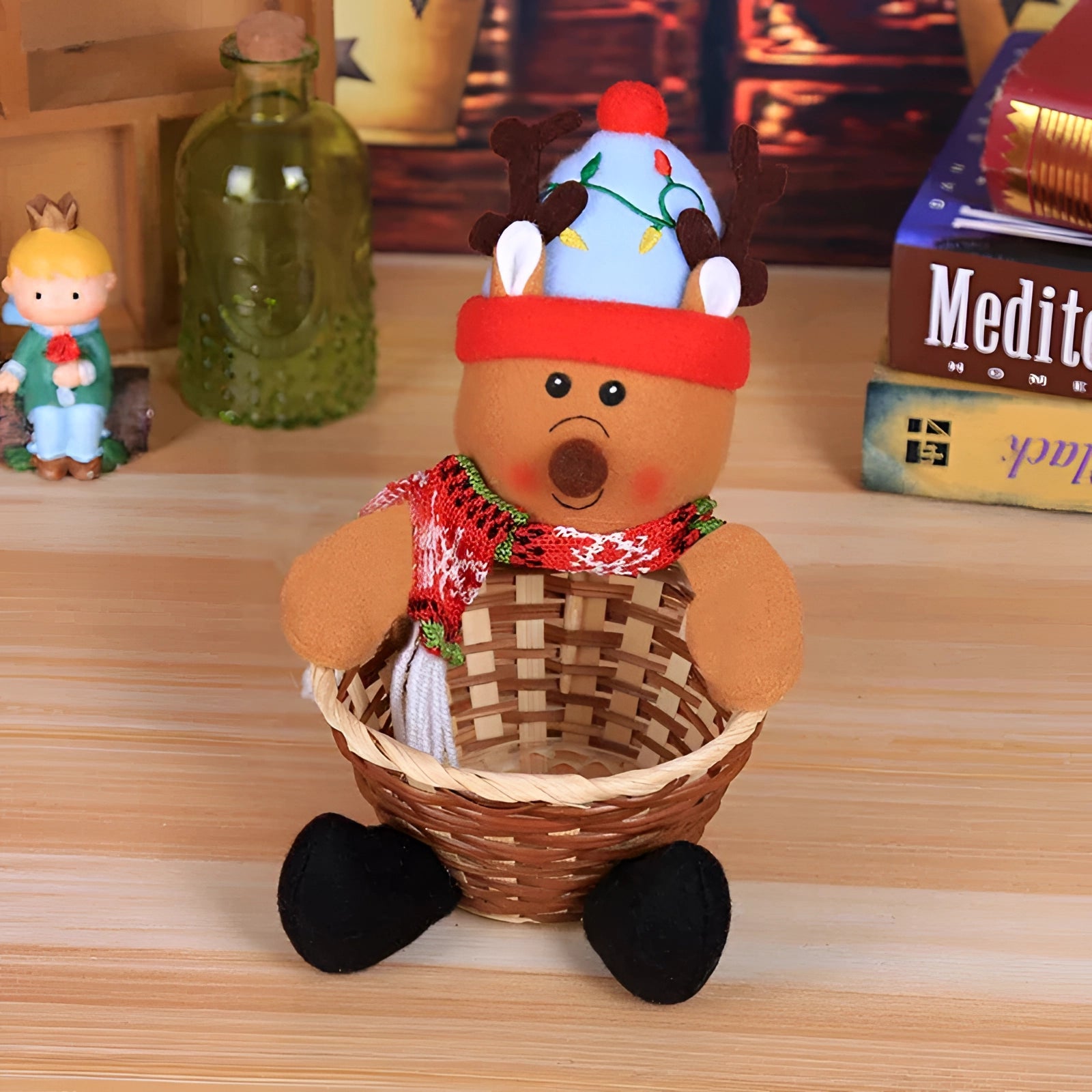 A festive gift basket featuring a gingerbread man plush toy wearing a costume hat, surrounded by holiday-themed kitchen decor, ideal for adding a touch of cheer to any renter's kitchen.