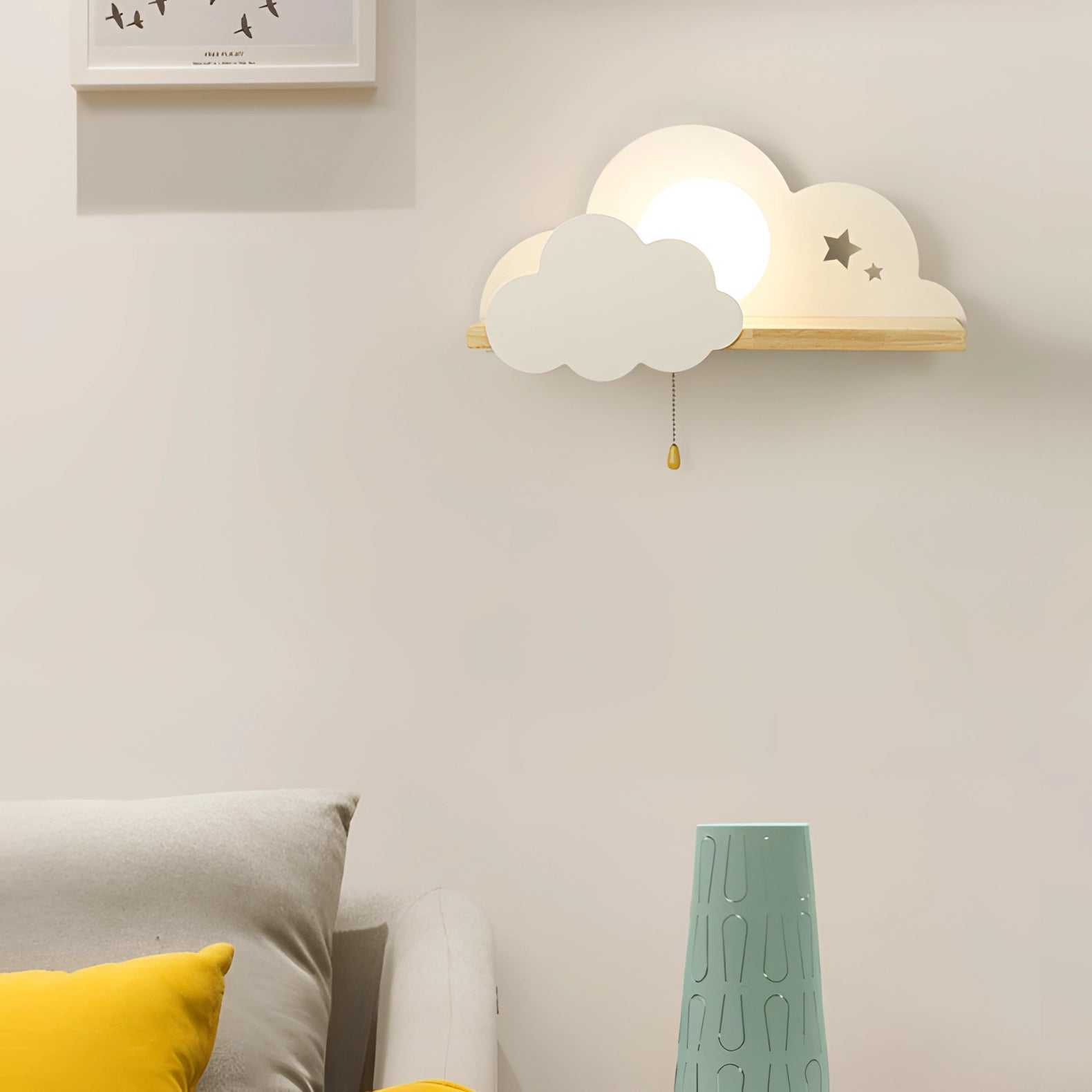 White cloud-shaped LED wall lamp designed for children's rooms, featuring a star night light fixture. It is mounted on a wall with a soft glow, ideal for bedtime, and compatible with 110 V-120 V for USA/Canada. The lamp is part of a cozy interior, adding a whimsical touch with its playful cloud shape.