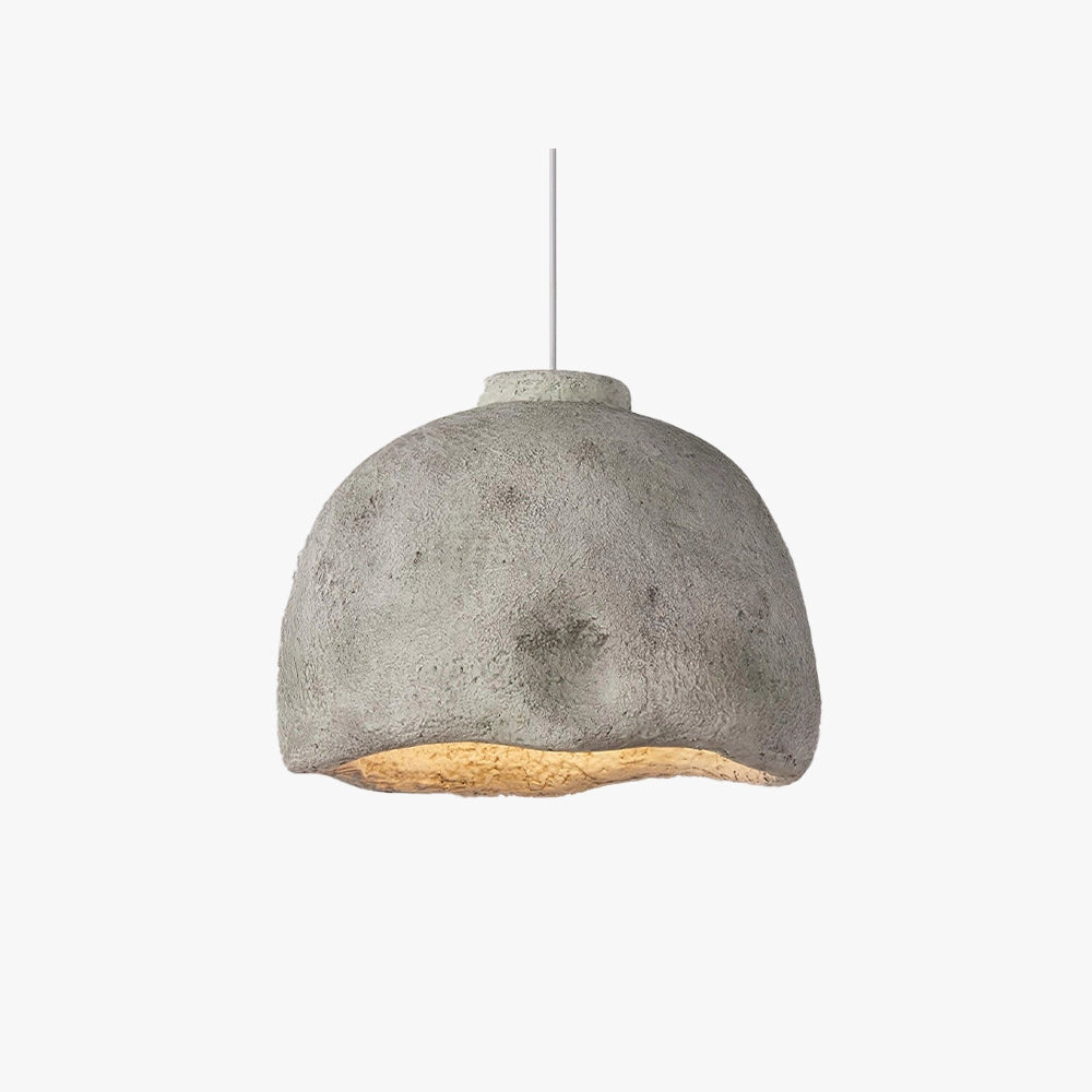 Concrete pendant light with a minimalist and industrial design, featuring a smooth, oval-shaped concrete shade hanging from a sleek cord, emphasizing eco-friendly materials in a modern aesthetic.