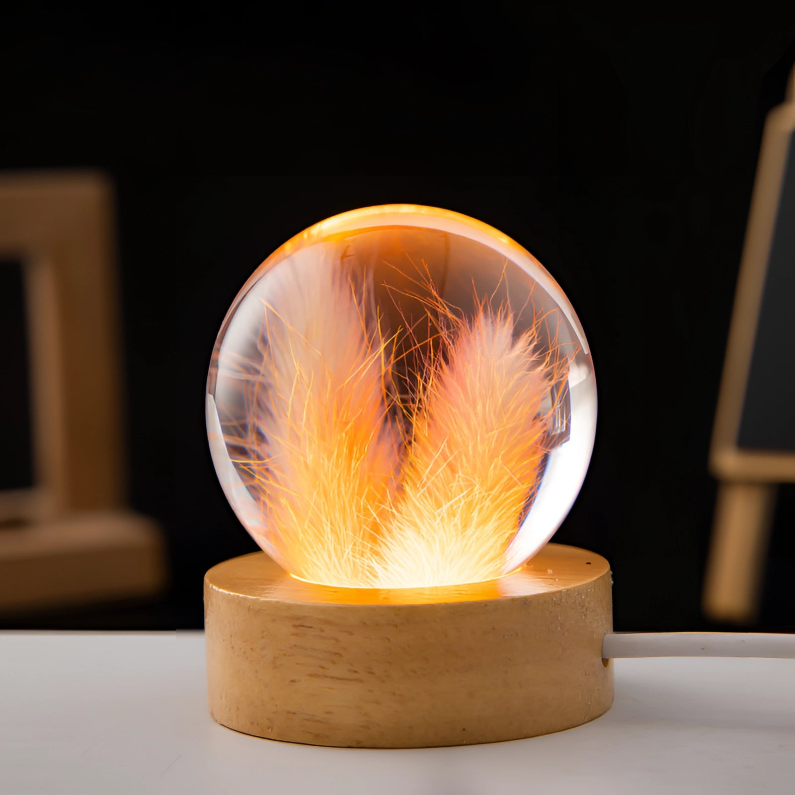 Dandelion resin lamp with LED lighting, featuring a botanical dandelion encased in clear resin on a wooden base, showcasing an artistic and unique night light design.