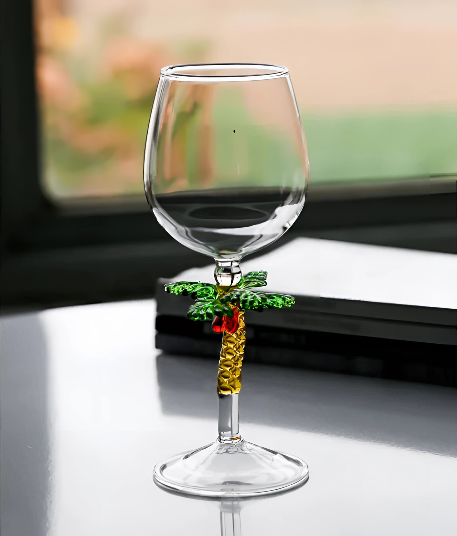 A set of decorative artistic handcrafted vineyard wine glasses displayed elegantly, showcasing their intricate design and clear stemware on a pristine surface.