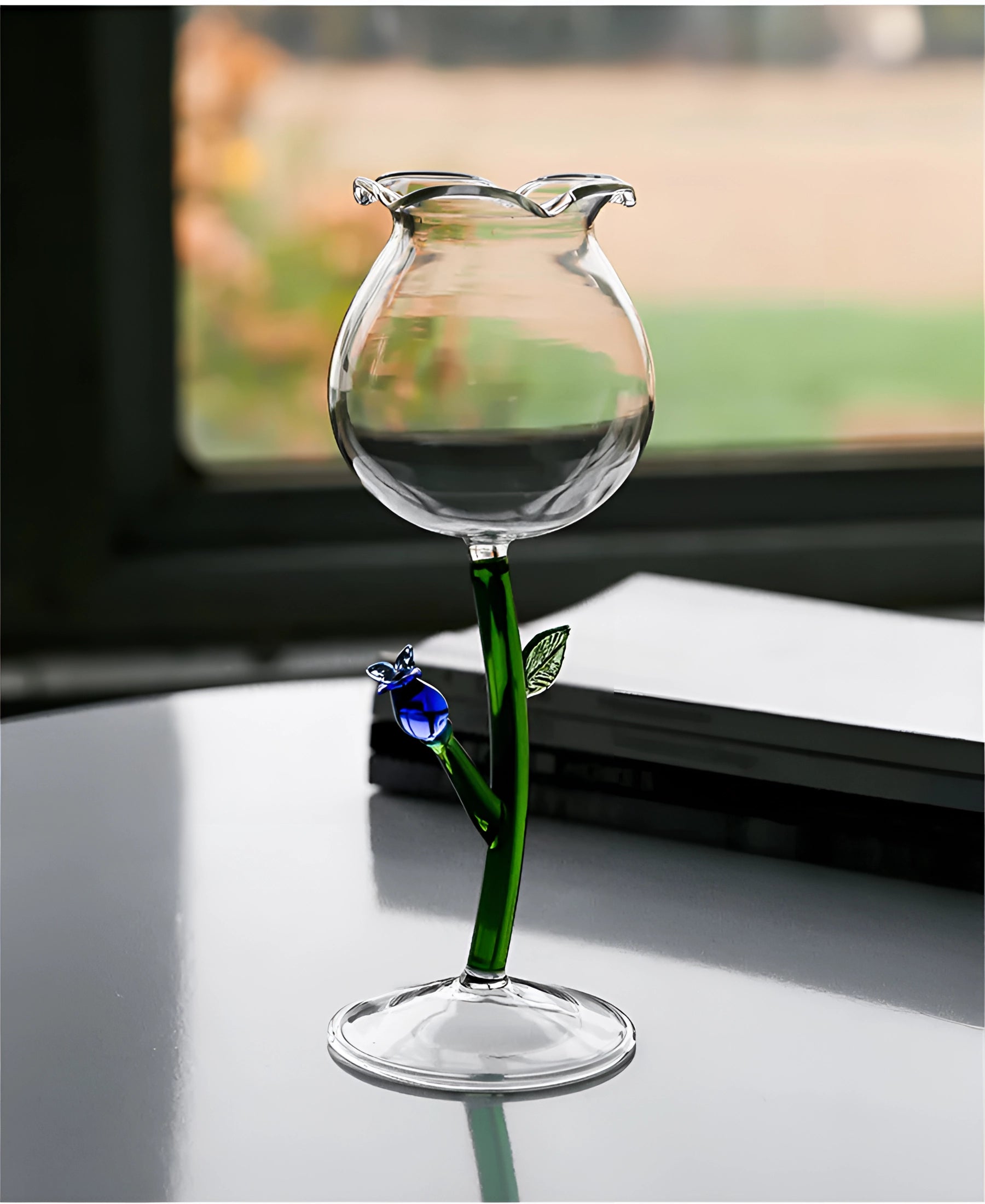 Set of Decorative Artistic Handcrafted Vineyard Wine Glasses with intricate designs, elegantly displayed, filled with liquid, showcasing their use as luxurious drinkware.