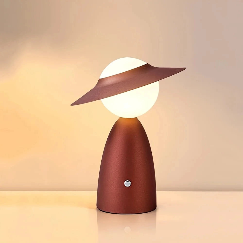 Modern UFO-shaped mushroom lamp with a wooden base and artistic bedside lighting, featuring sleek tints and shades for an elegant, contemporary look.