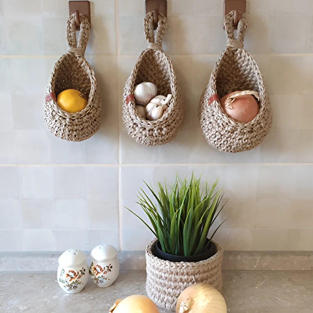 Eco-friendly jute hanging baskets featuring a rustic and boho chic design, filled with vibrant houseplants and flowers, showcasing natural materials and adding a touch of nature-inspired decor to any space.