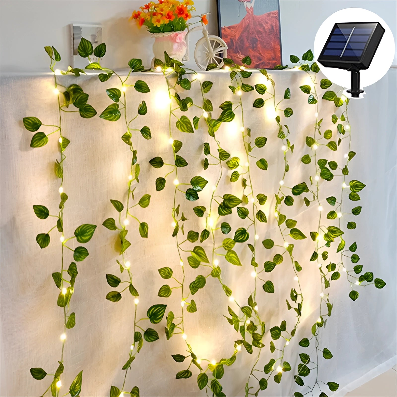 Eco-friendly LED ivy fairy lights with watermelon leaf design, featuring a 10-meter vine adorned with 100 LEDs, arranged in a symmetrical pattern, ideal for creative urban and floral design aesthetics.