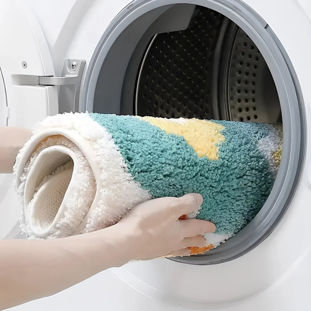 Colorful floral non-slip bath rug displayed in a laundry room setting, showcasing its soft texture and decorative design.