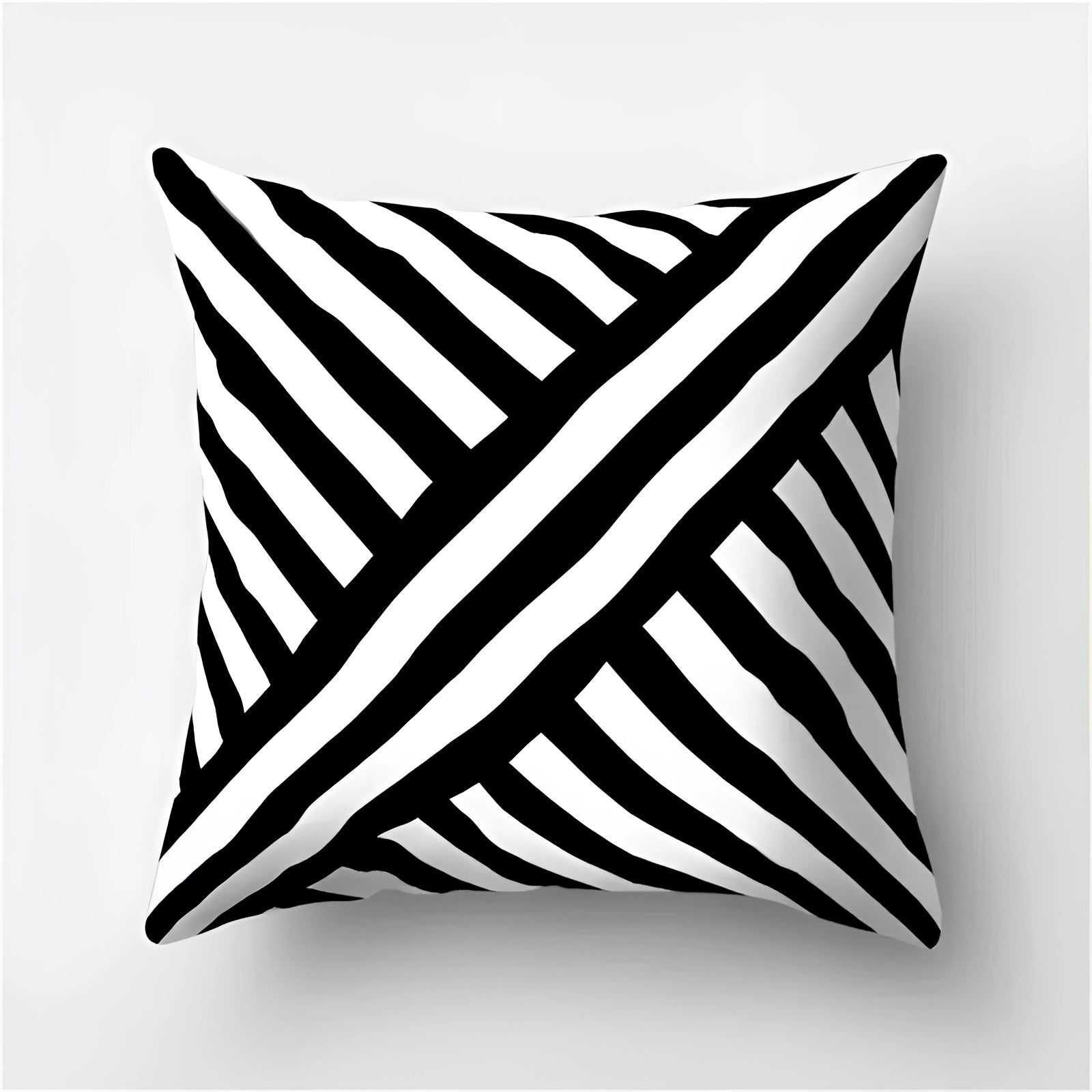 A modern decorative pillow featuring a geometric black and white abstract design with a pattern of rectangles and triangles, measuring 60 x 60 cm.