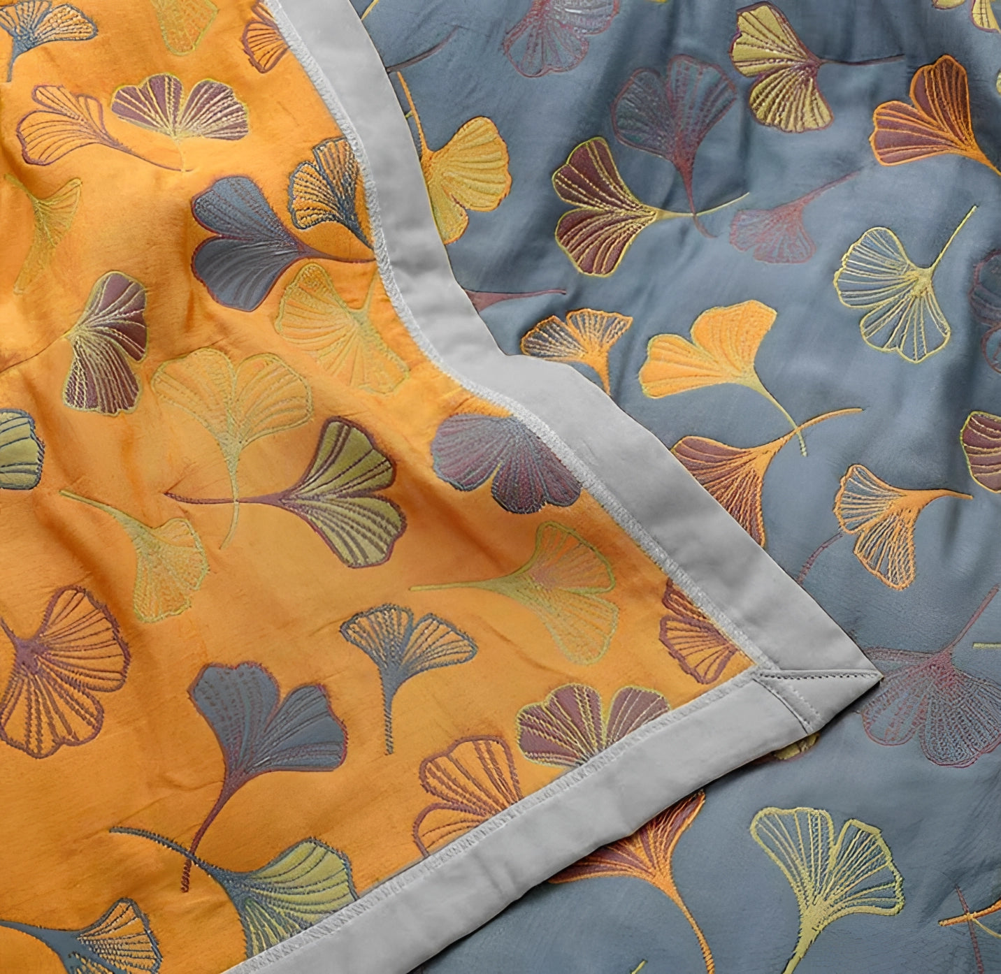 Yellow and gray duvet cover featuring a Ginkgo leaf pattern, showcasing fall bedding decor with a blend of artistic leaf designs and textile textures.