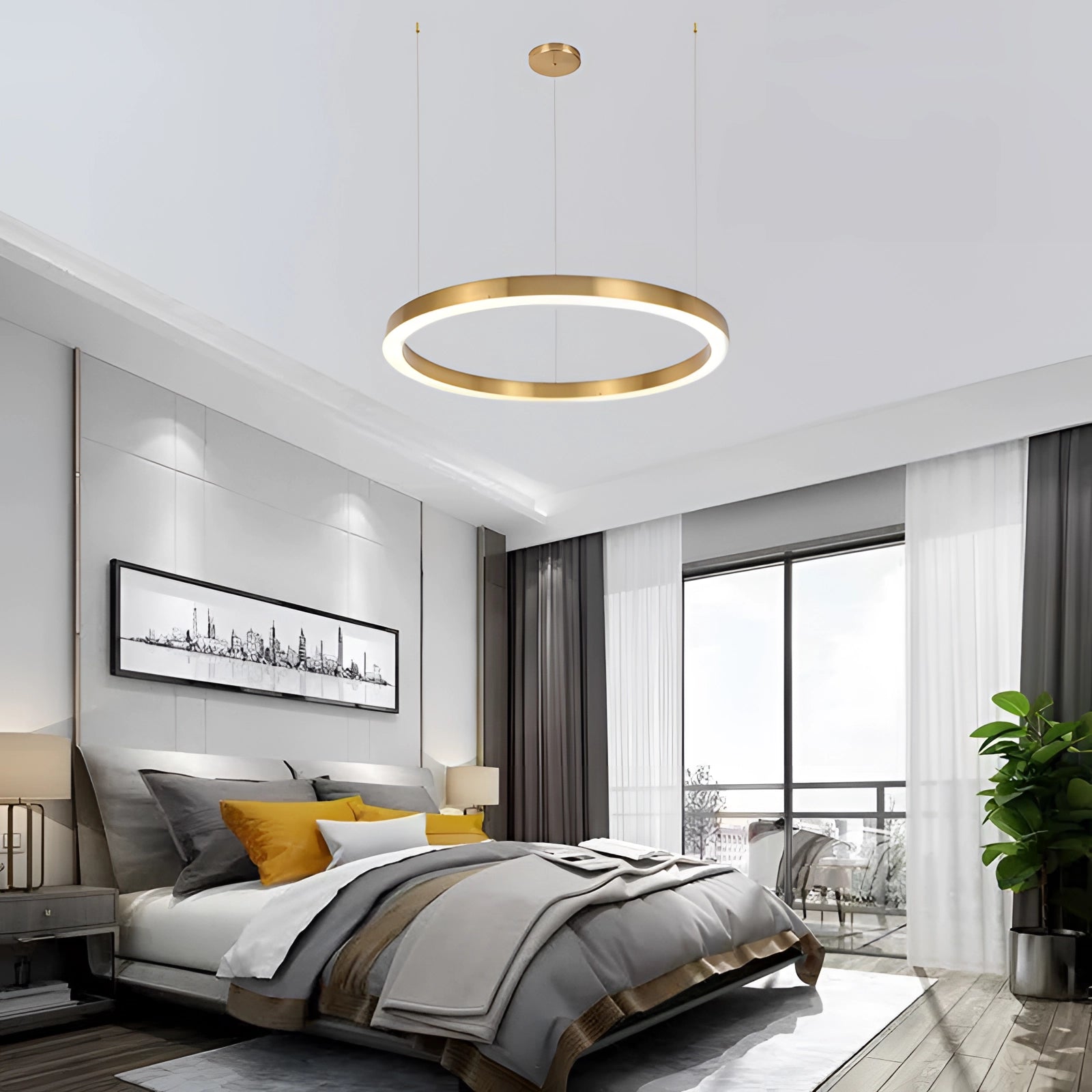 Gold Circular LED Chandelier in a modern minimalist style, featuring a sleek design with a 23.5-inch diameter, emitting white light, hanging in a stylishly decorated room with houseplants, wooden elements, and large windows.