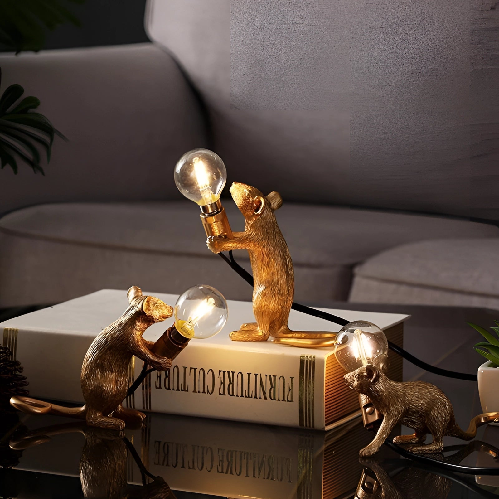 A quirky gold mouse-shaped lamp placed on a wooden surface, surrounded by houseplants and decorative elements, blending art and eccentric decor.
