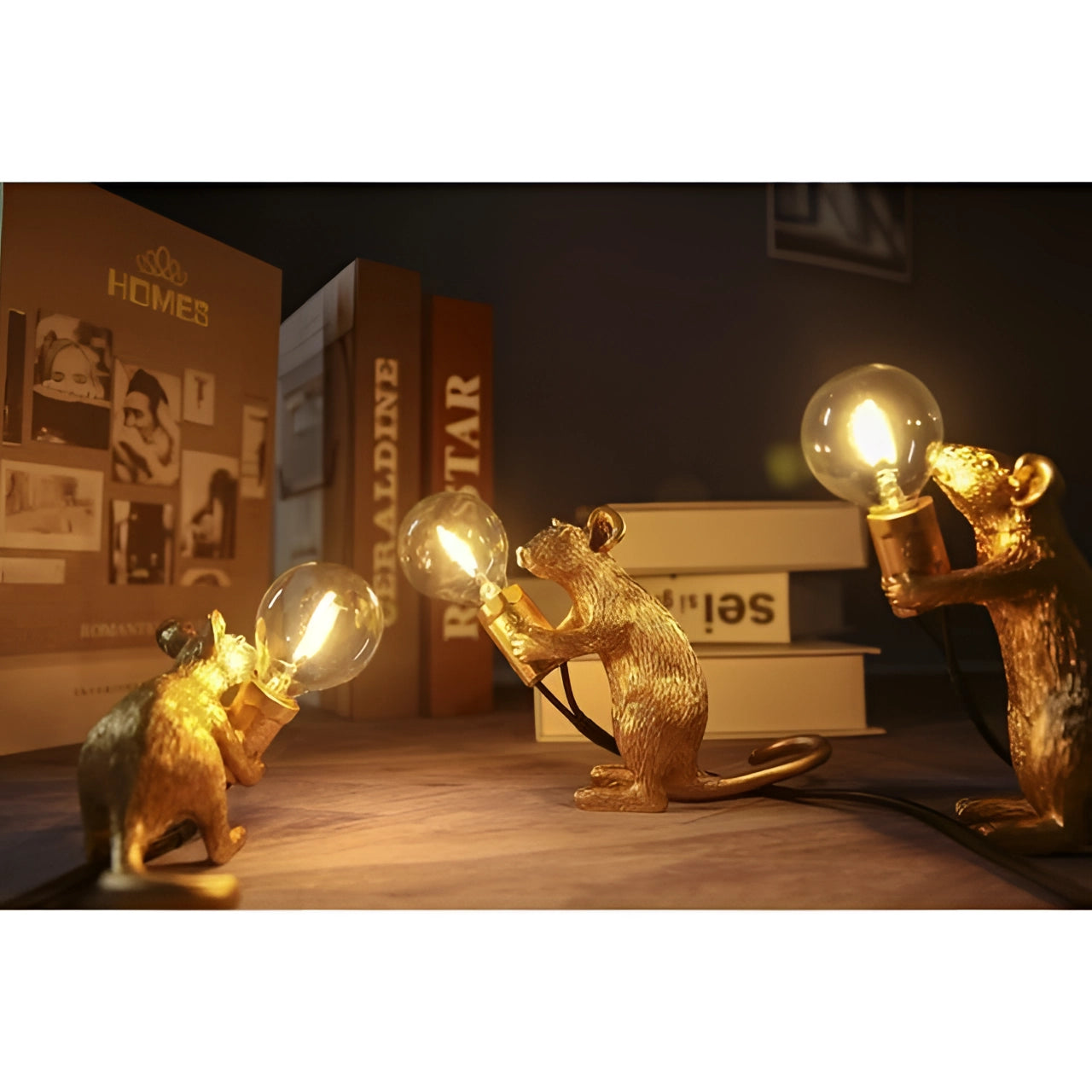 A quirky gold mouse-shaped desk lamp with a metallic finish, part of an eccentric decor set, featuring a playful design that combines art and functionality. The lamp is crafted to resemble a sculpture, making it a unique lighting fixture for any room.