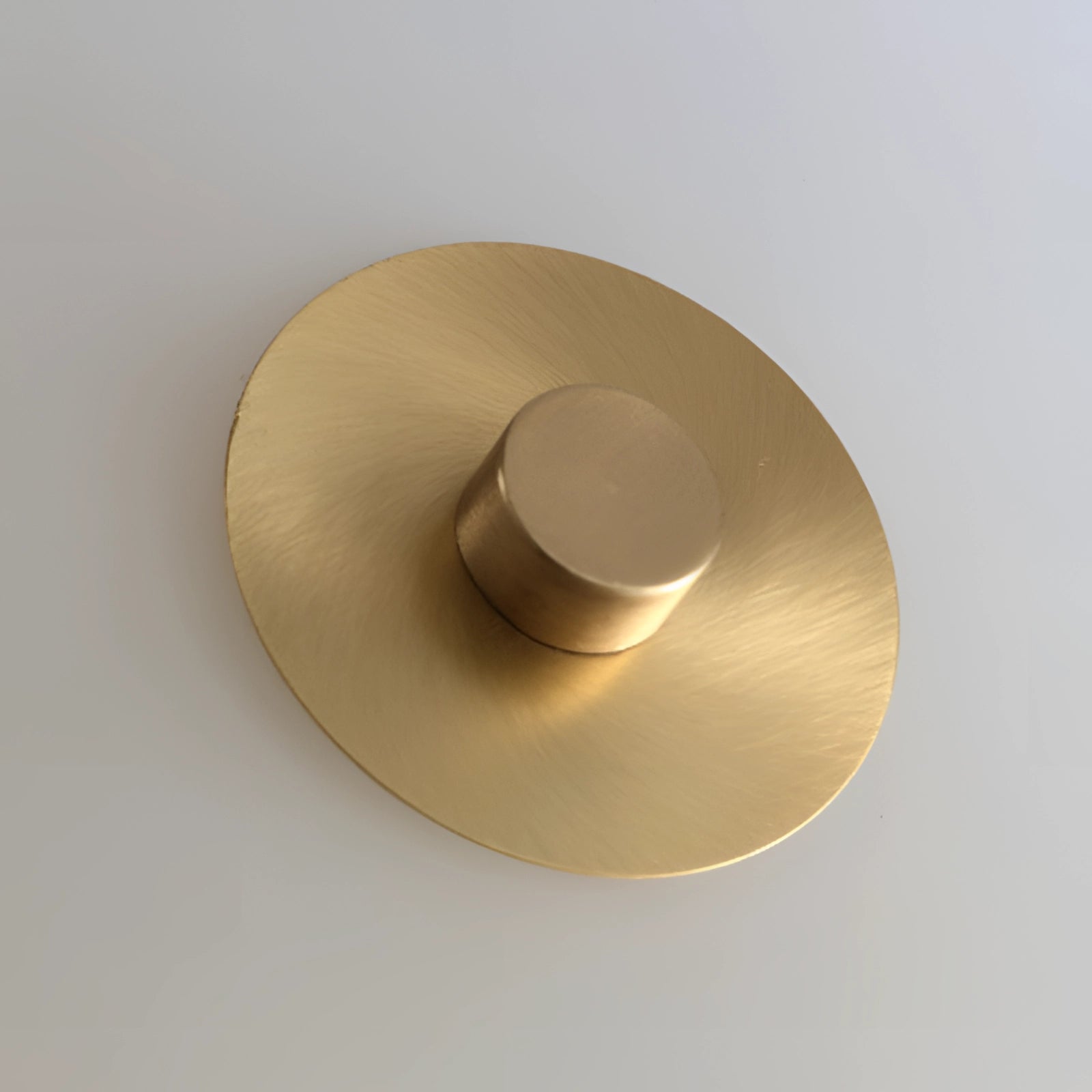 Elegant circular flush mount ceiling light with a gold-trimmed edge, showcasing a sophisticated design. The light features a beige and wood finish, complementing its metal accents, enhancing its decorative appeal.