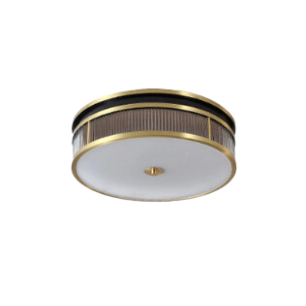 Gold-trimmed circular flush mount ceiling light fixture with a sleek metal rim, designed for elegant home decor.