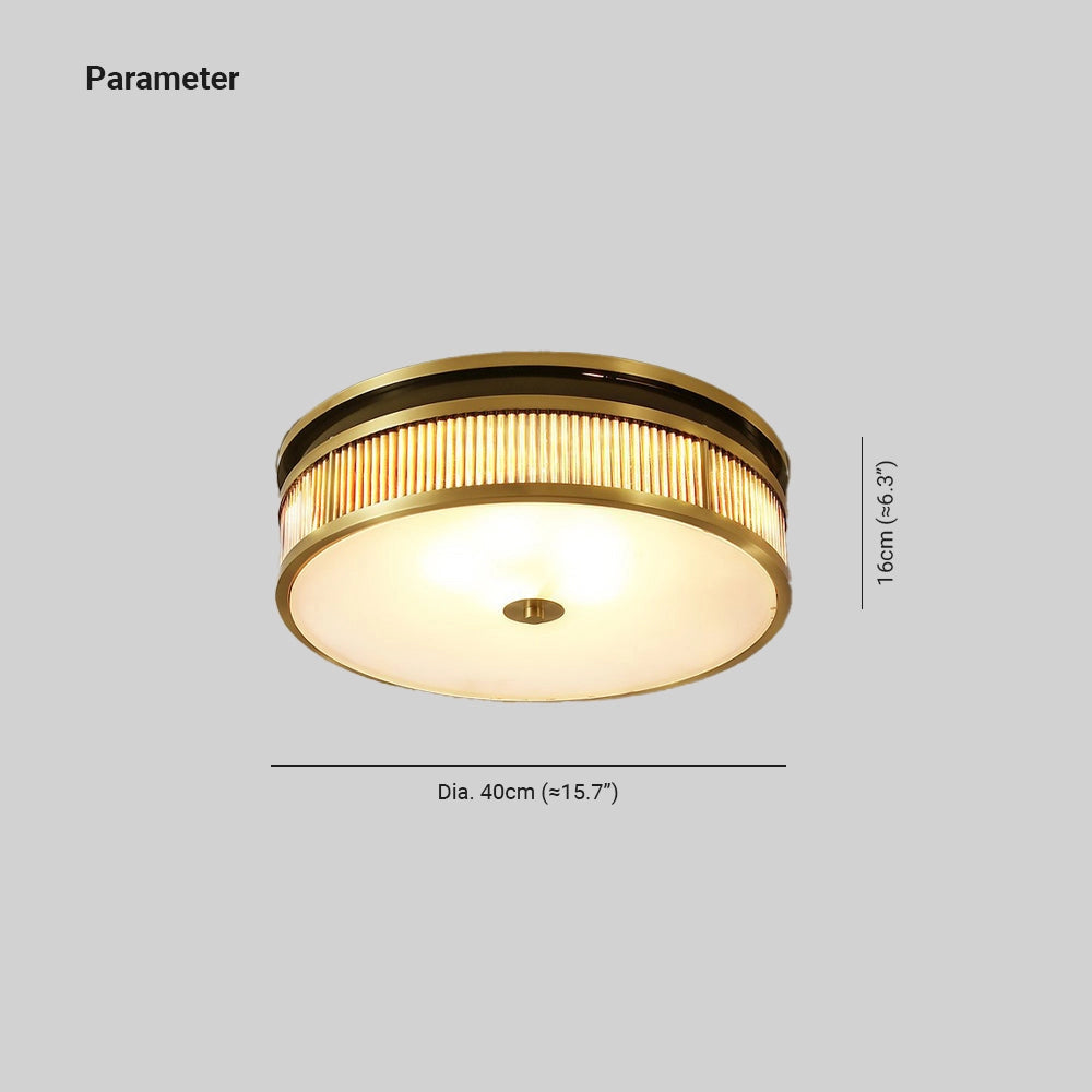 Gold-trimmed circular flush mount ceiling light with an elegant decorative design, featuring a sleek metal frame and soft amber lighting.