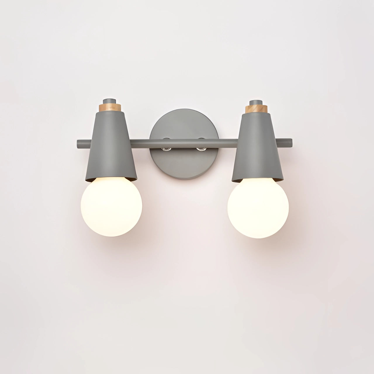 Modern Scandinavian green triple pendant light with two gray dome-shaped lampshades, featuring energy-efficient design, mounted on a ceiling.