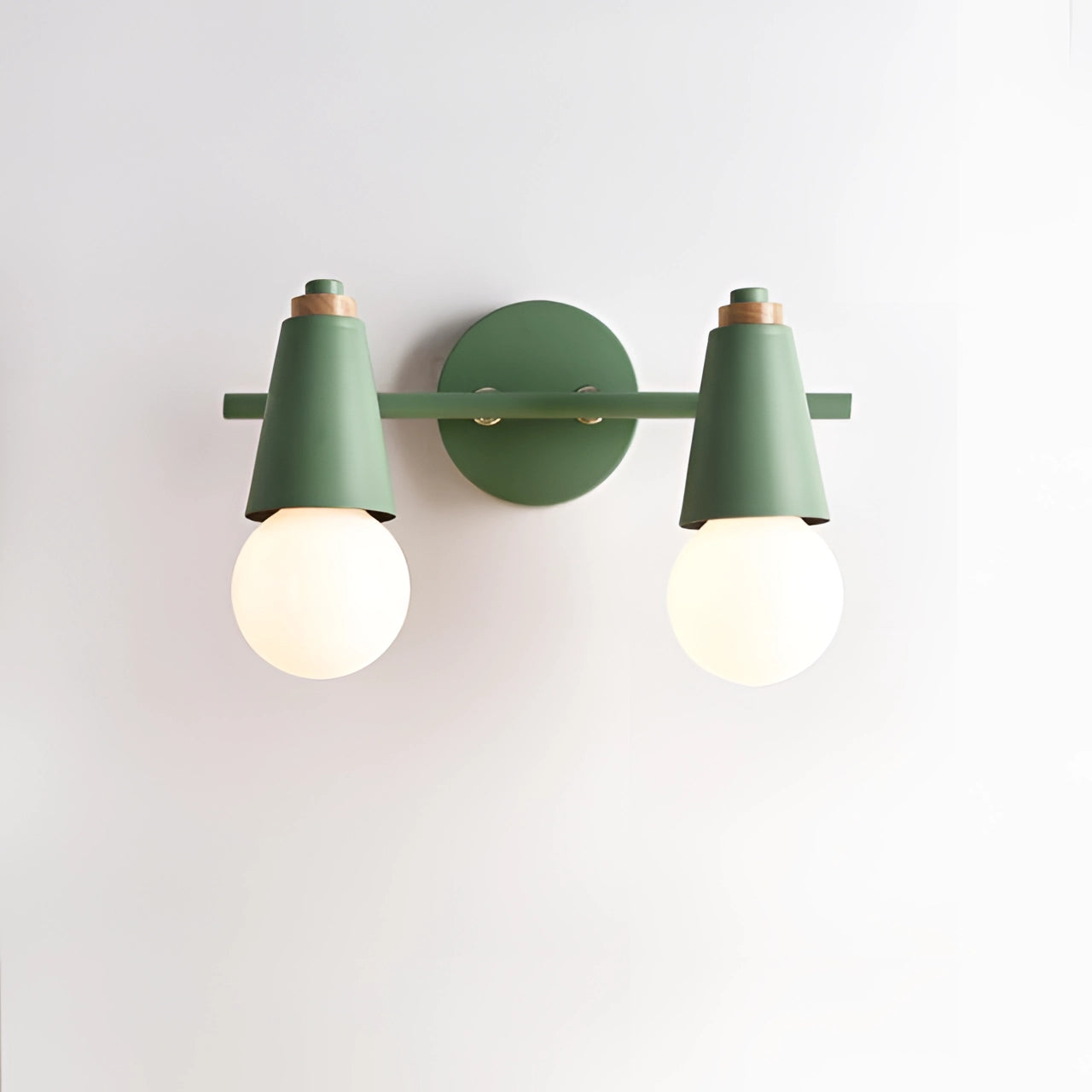 Green Triple Pendant light fixture with two cone-shaped green lampshades, modern Scandinavian design, energy-efficient, hanging from the ceiling.