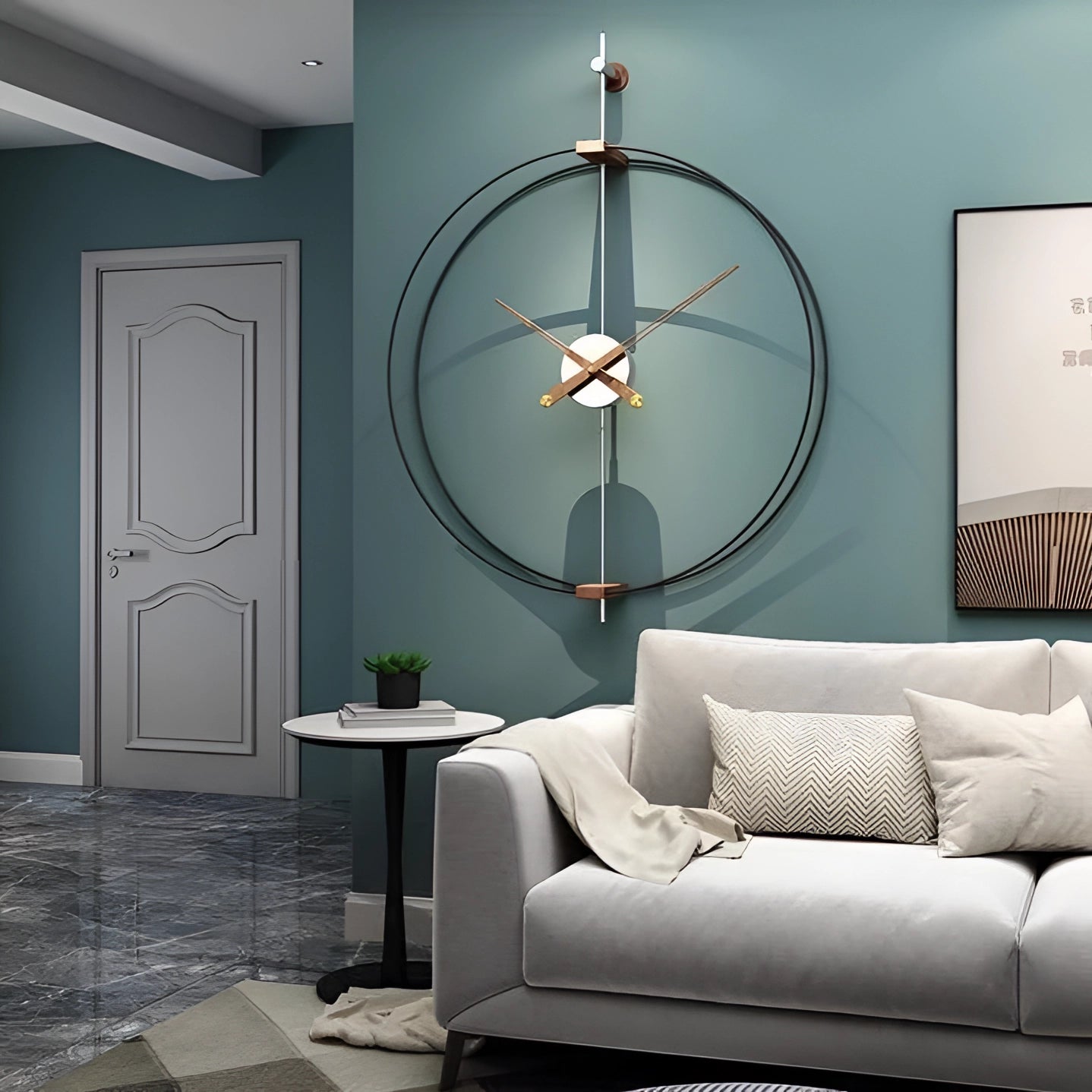 Large luxury metal wall clock with a modern minimalist design, featured in a stylish interior setting with contemporary furniture and decor, including wooden and metal elements, and soft ambient lighting.