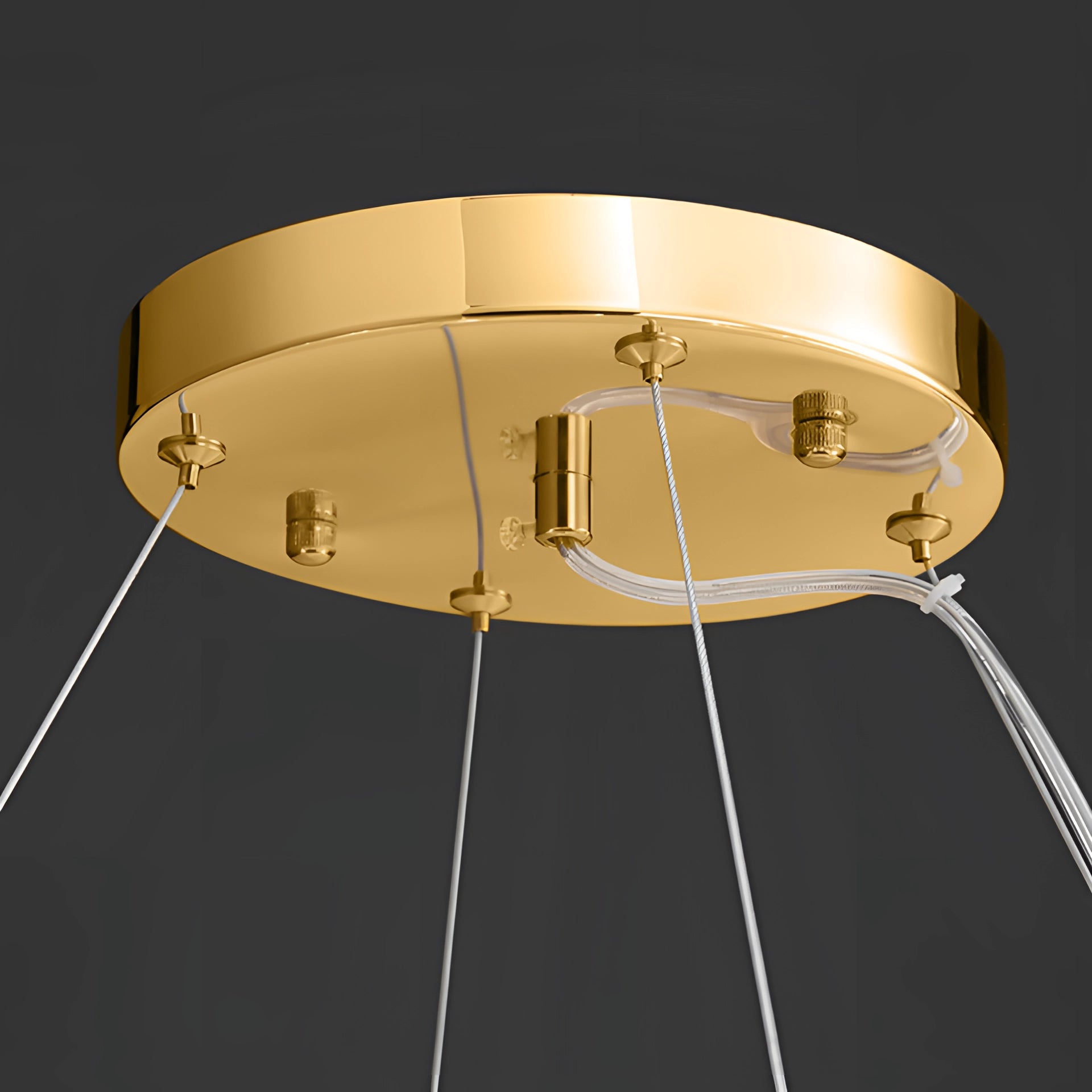 Modern leaf-shaped gold chandelier with elegant design, illuminating a luxury bedroom, featuring intricate details and a sophisticated ceiling fixture.