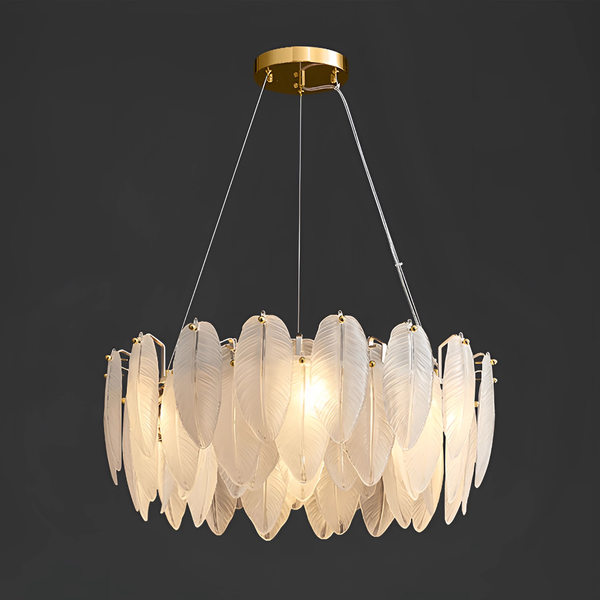 Modern elegant leaf-shaped gold chandelier hanging in a luxurious bedroom, featuring intricate metalwork and multiple light bulbs.