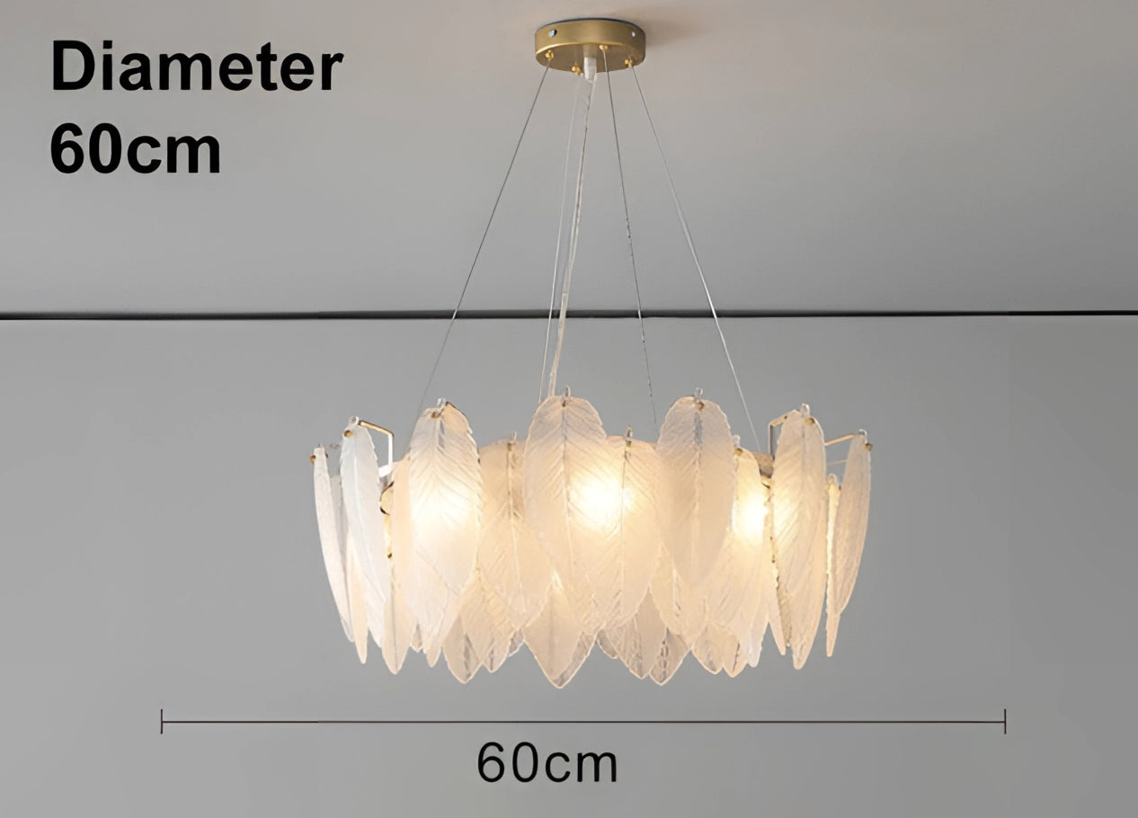 Leaf-shaped gold chandelier with intricate design, 60 cm, hanging from the ceiling, illuminating a modern elegant luxury bedroom.